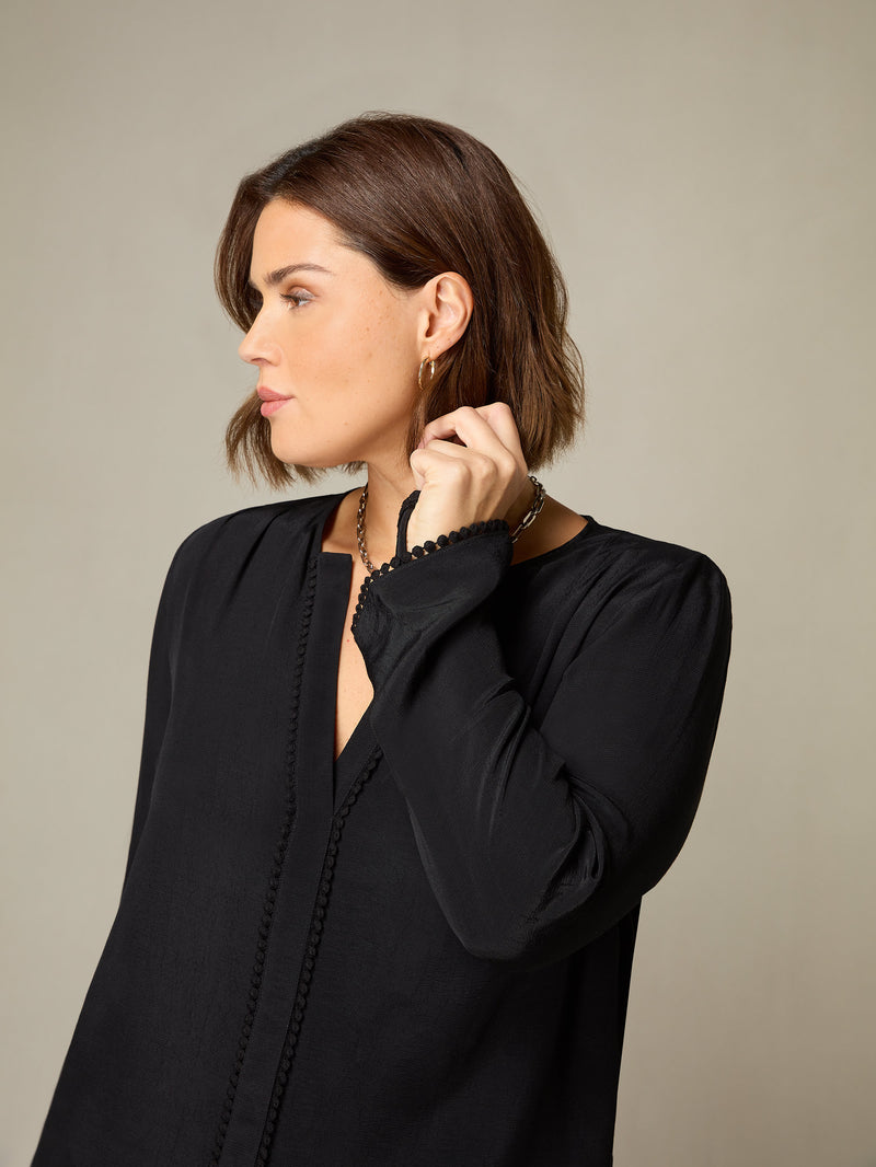 Black Flute Sleeve Blouse