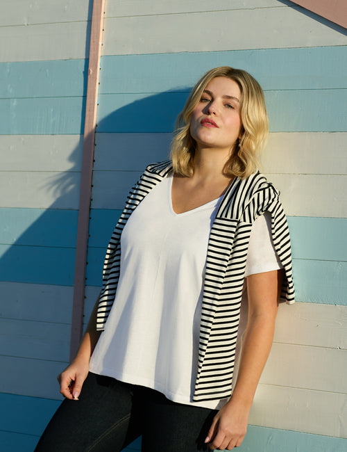Model wears our White Cotton Slub V-neck T-shirt with Navy Stripe Jersey Relaxed Top