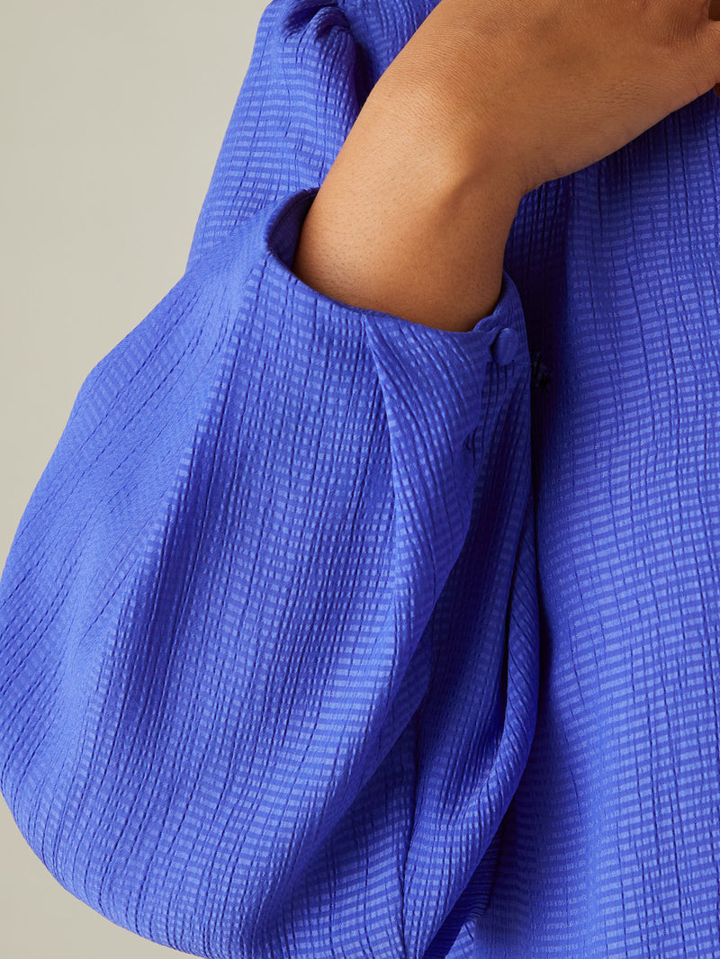 Blue Textured V-Neck Blouse