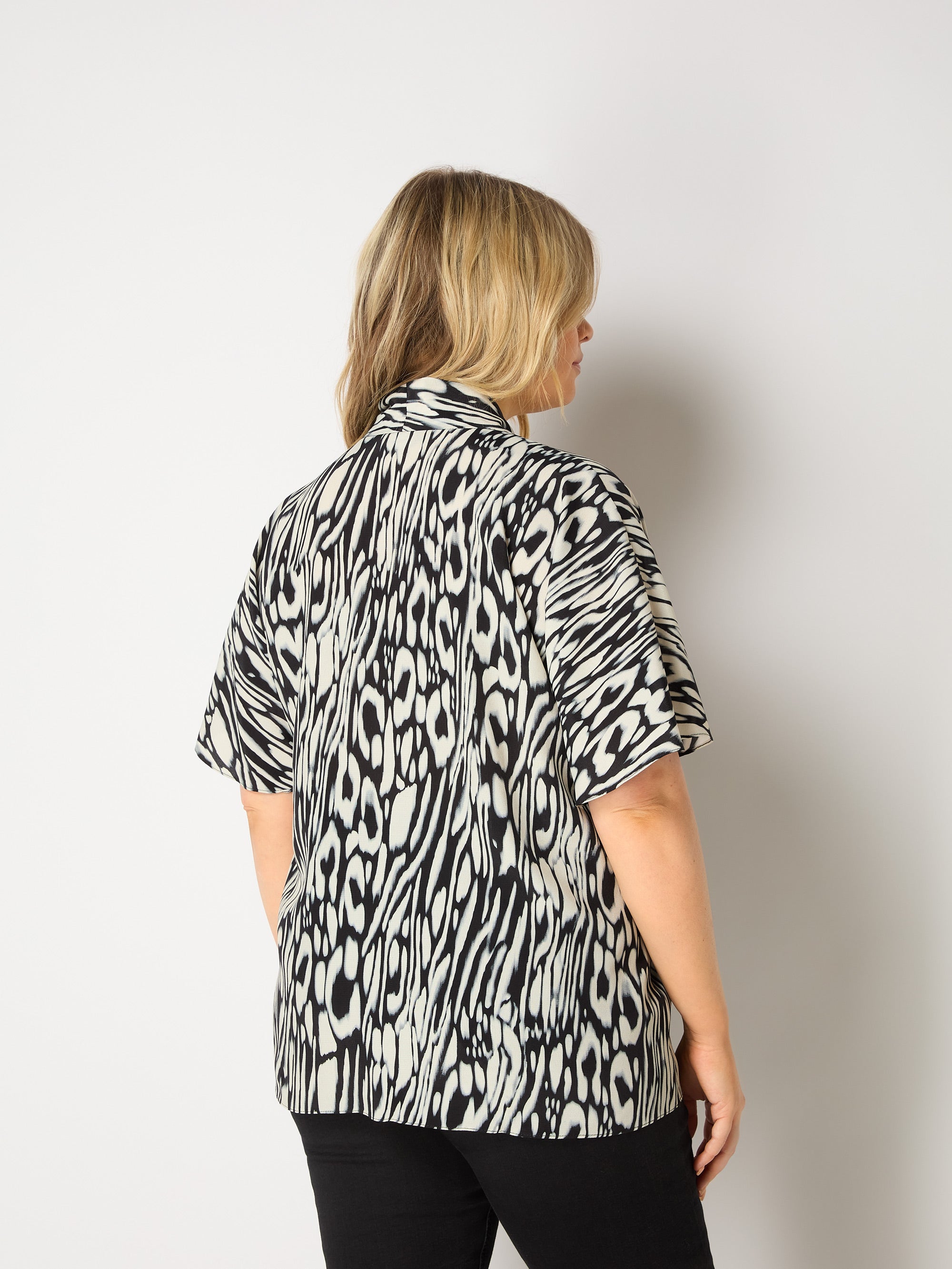 Abstract Leopard V-Neck Blouse