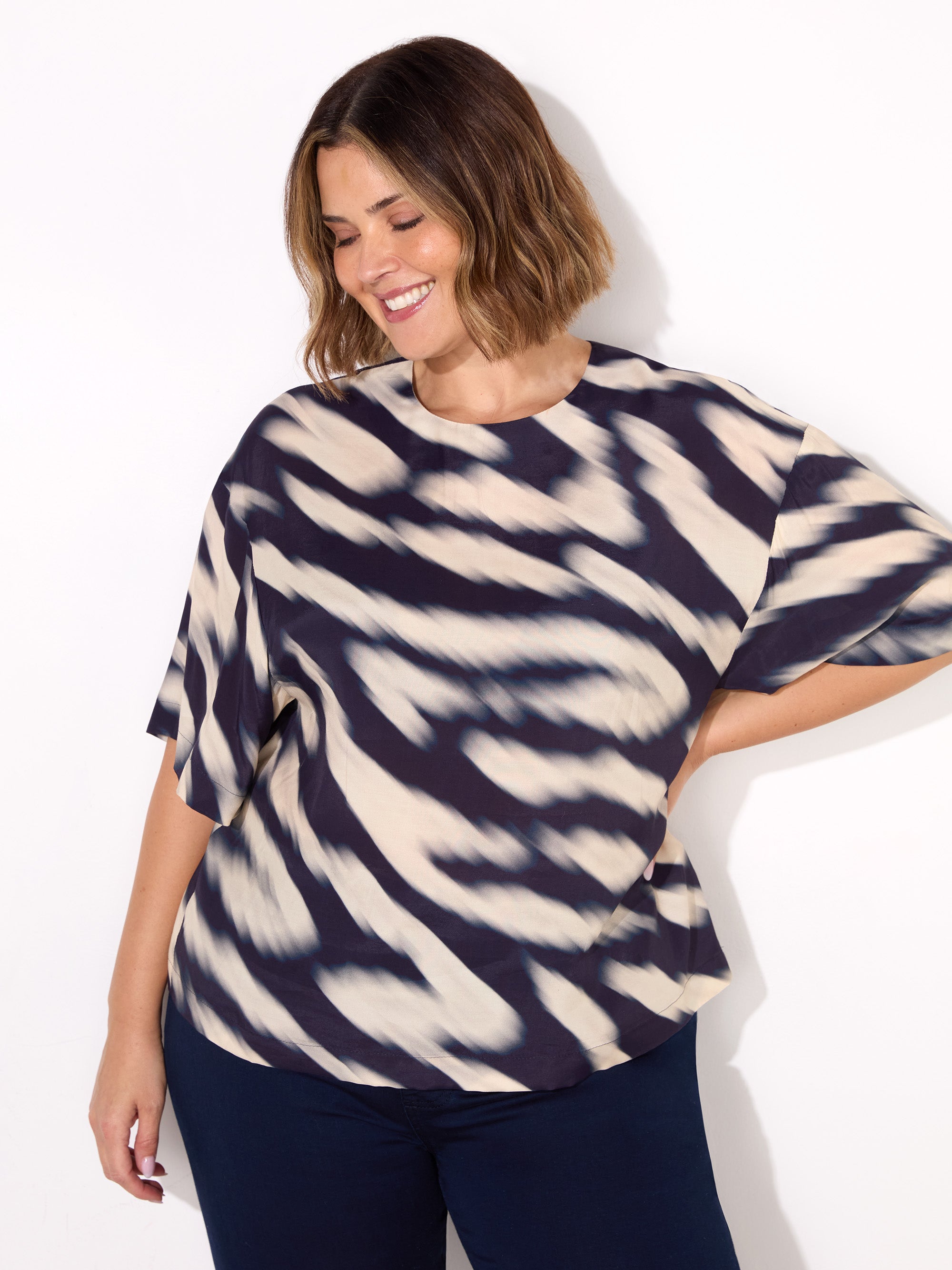 Blurred Animal Print Elevated Woven Top