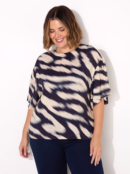 Blurred Animal Print Elevated Woven Top