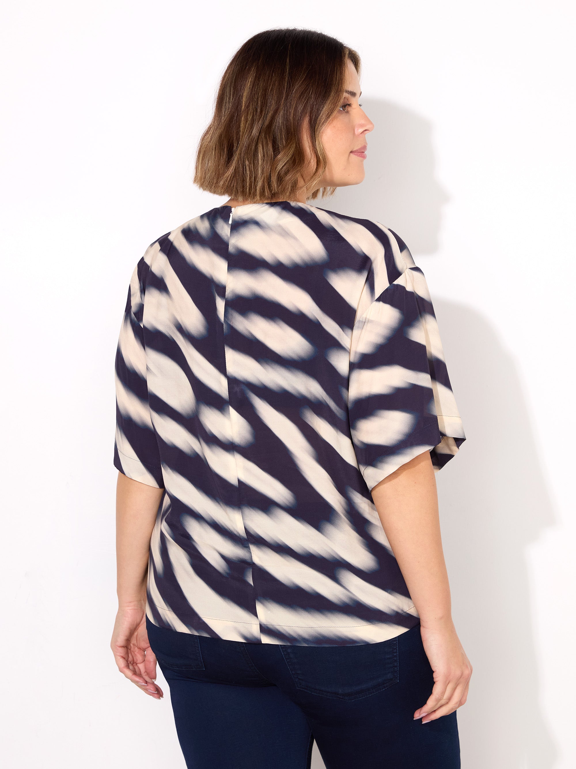 Blurred Animal Print Elevated Woven Top