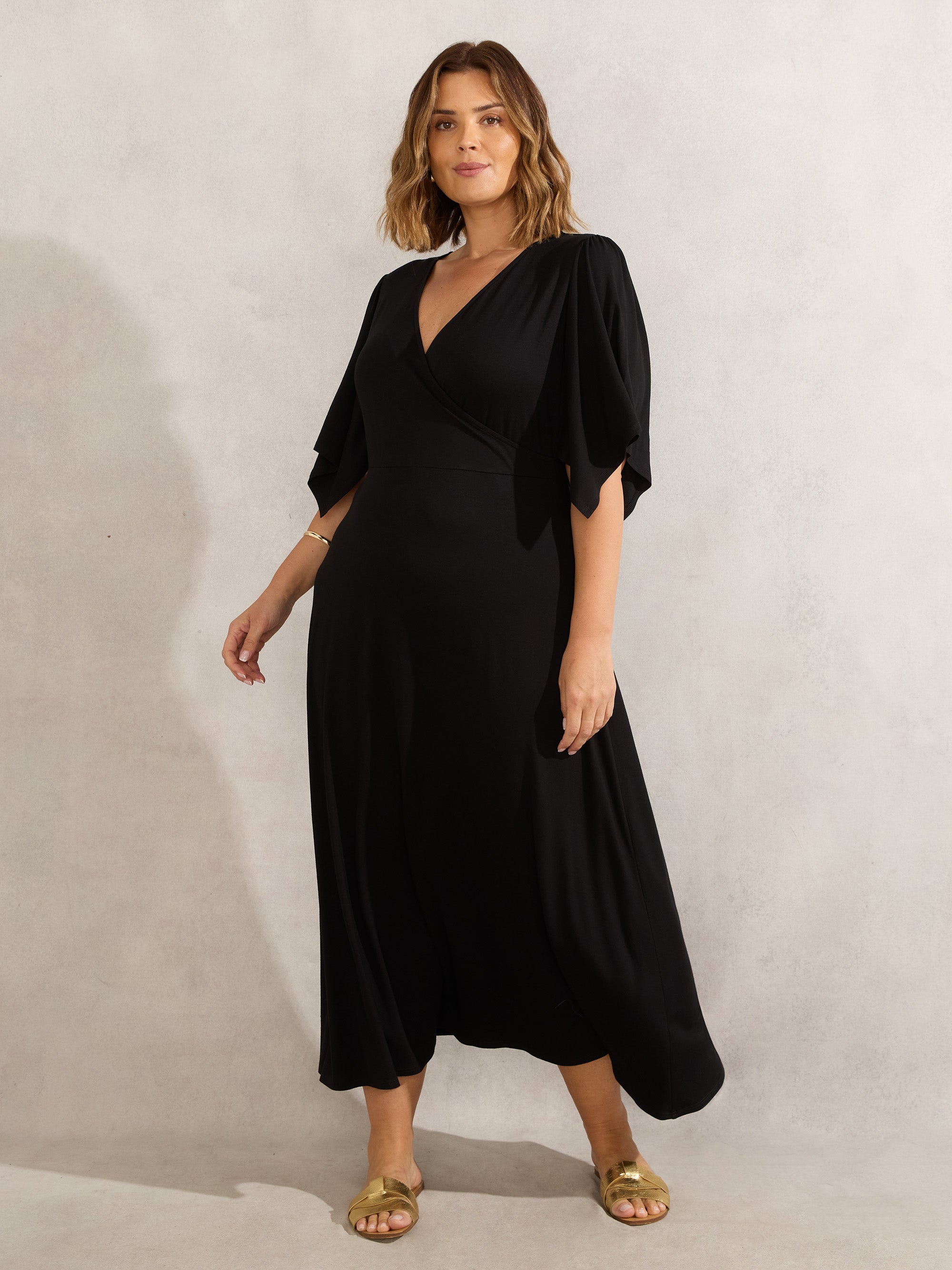 Black Jersey Angel Sleeve Wrap Dress