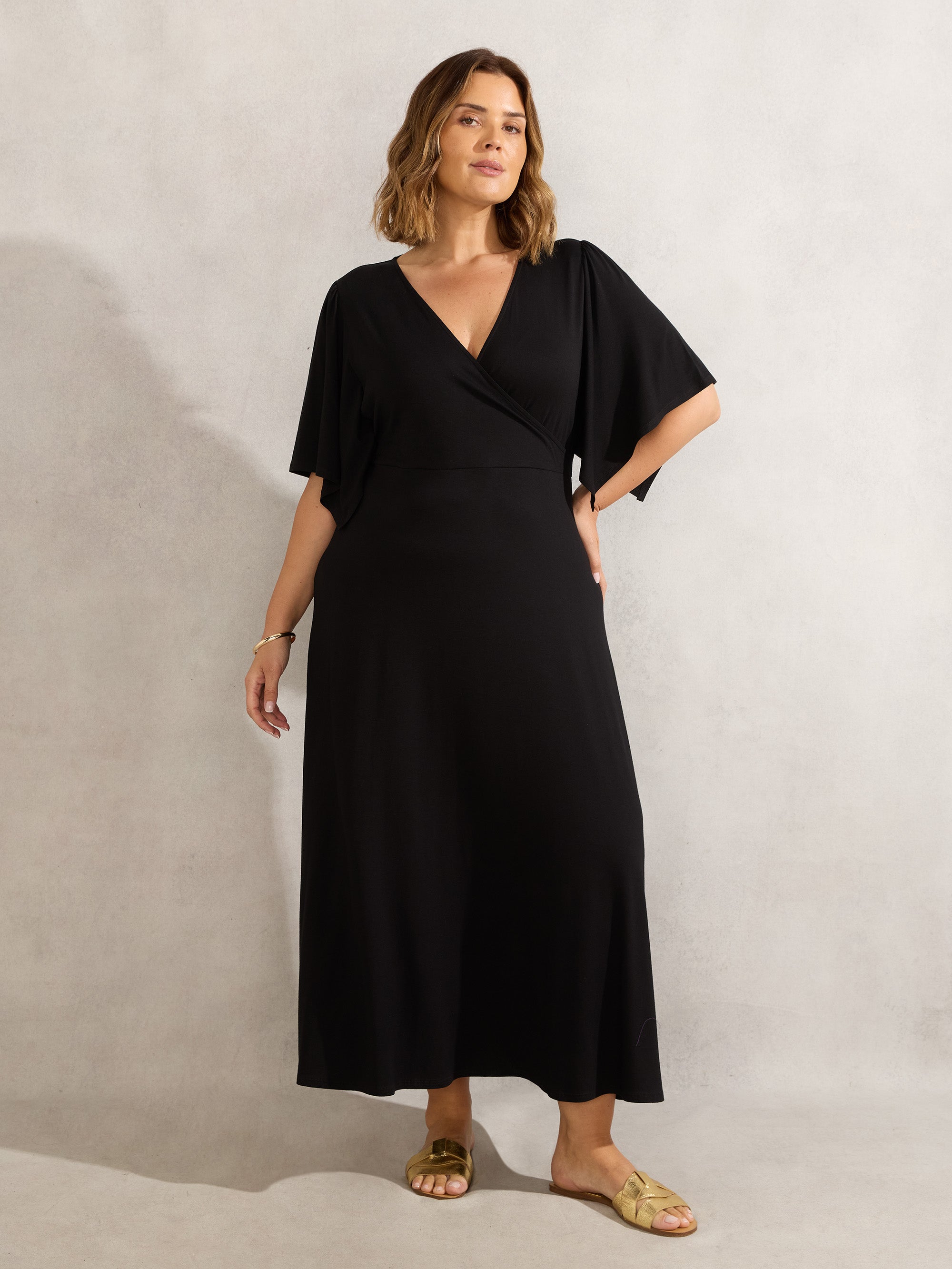 Black Jersey Angel Sleeve Wrap Dress