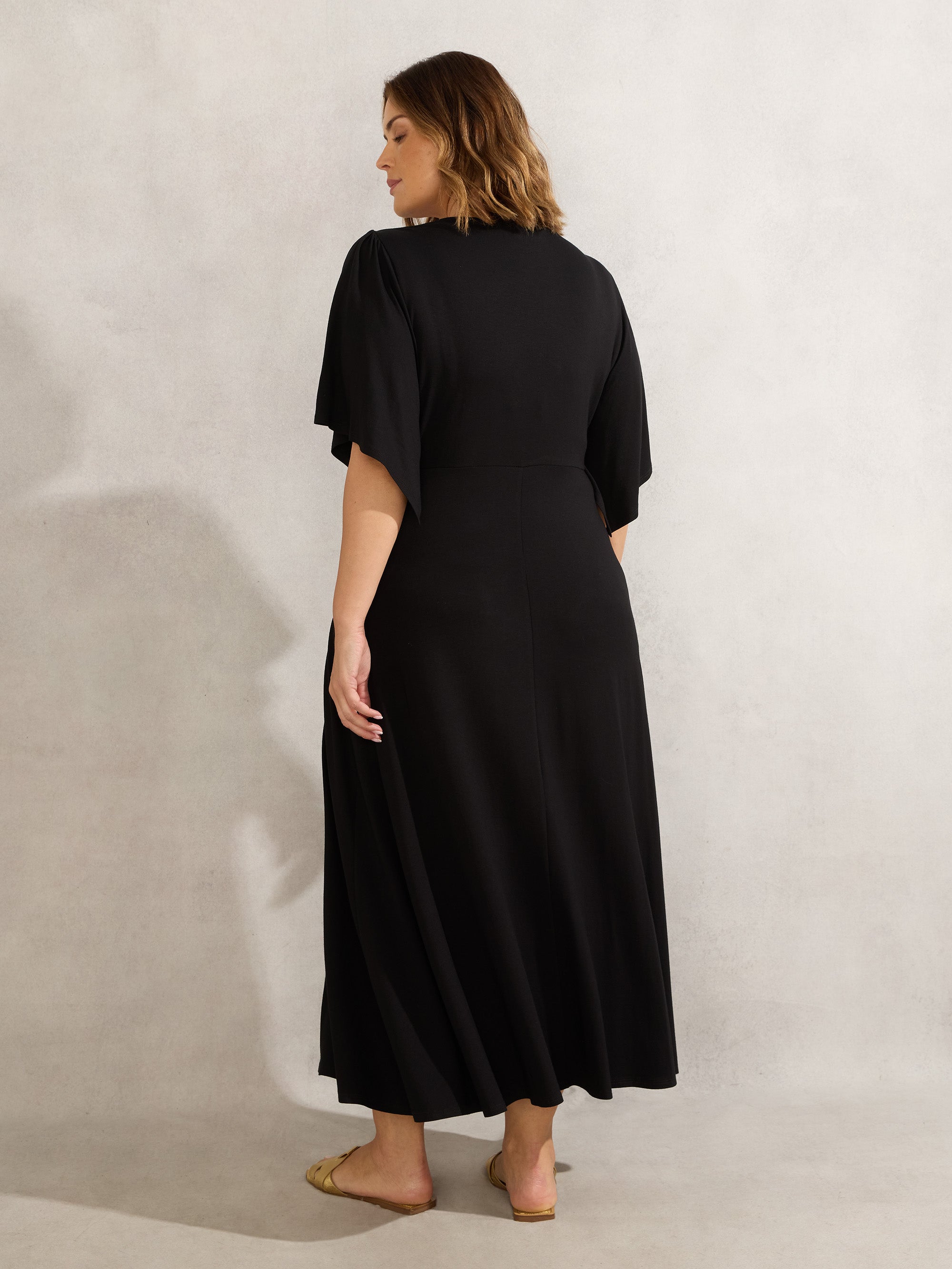Black Jersey Angel Sleeve Wrap Dress