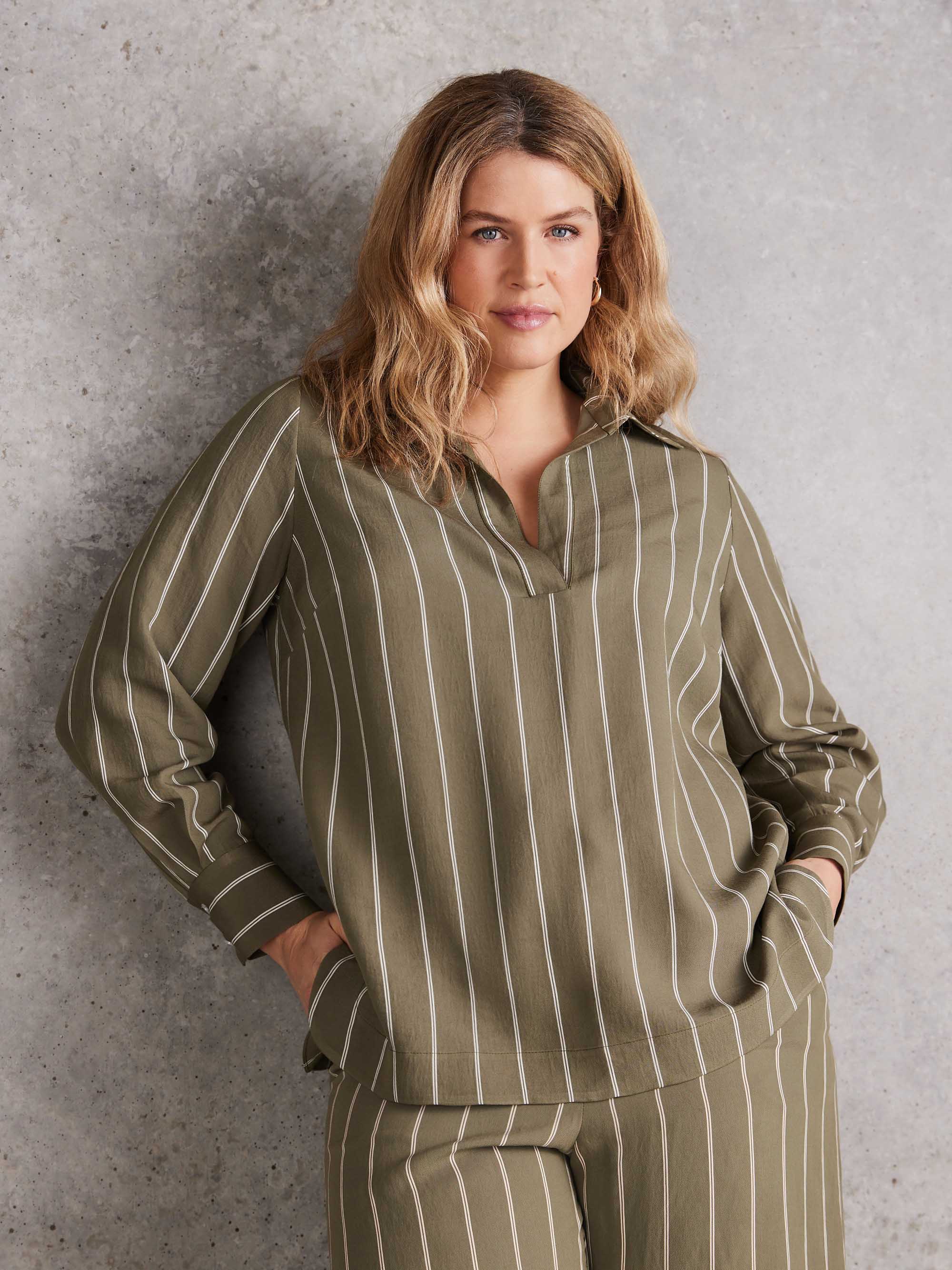 Khaki vertical stripe long sleeve shirt featuring open collar neckline