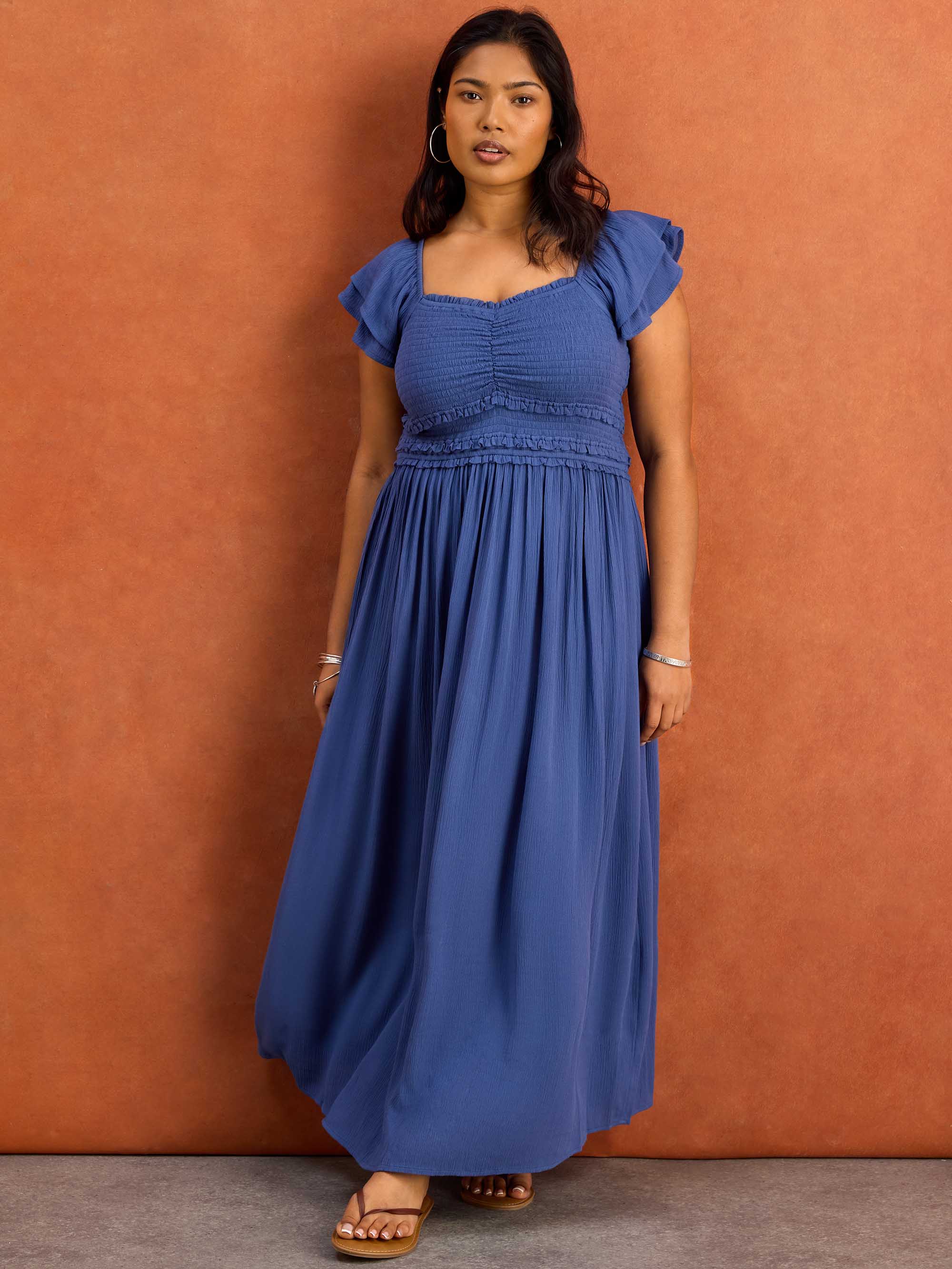 Blue shirred bodice flutter sleeve midaxi dress full length