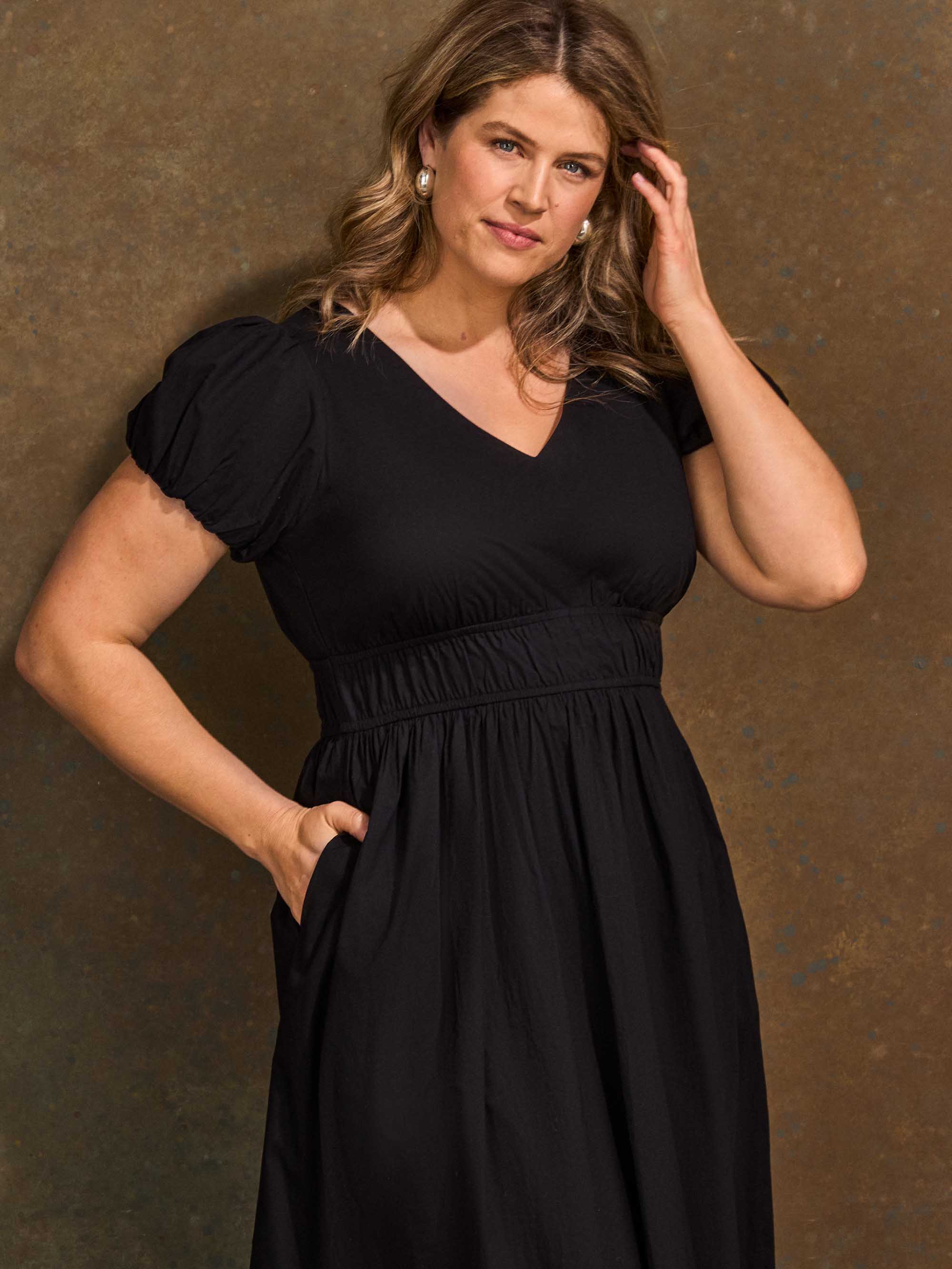 Black smocked waist puff sleeve midaxi dress