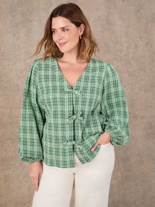 Plus size green check V neck blouse featuring bow tie front detail