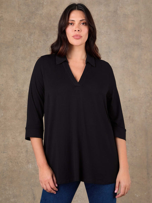 Black jersey shirt top with relaxed fit and collar detail