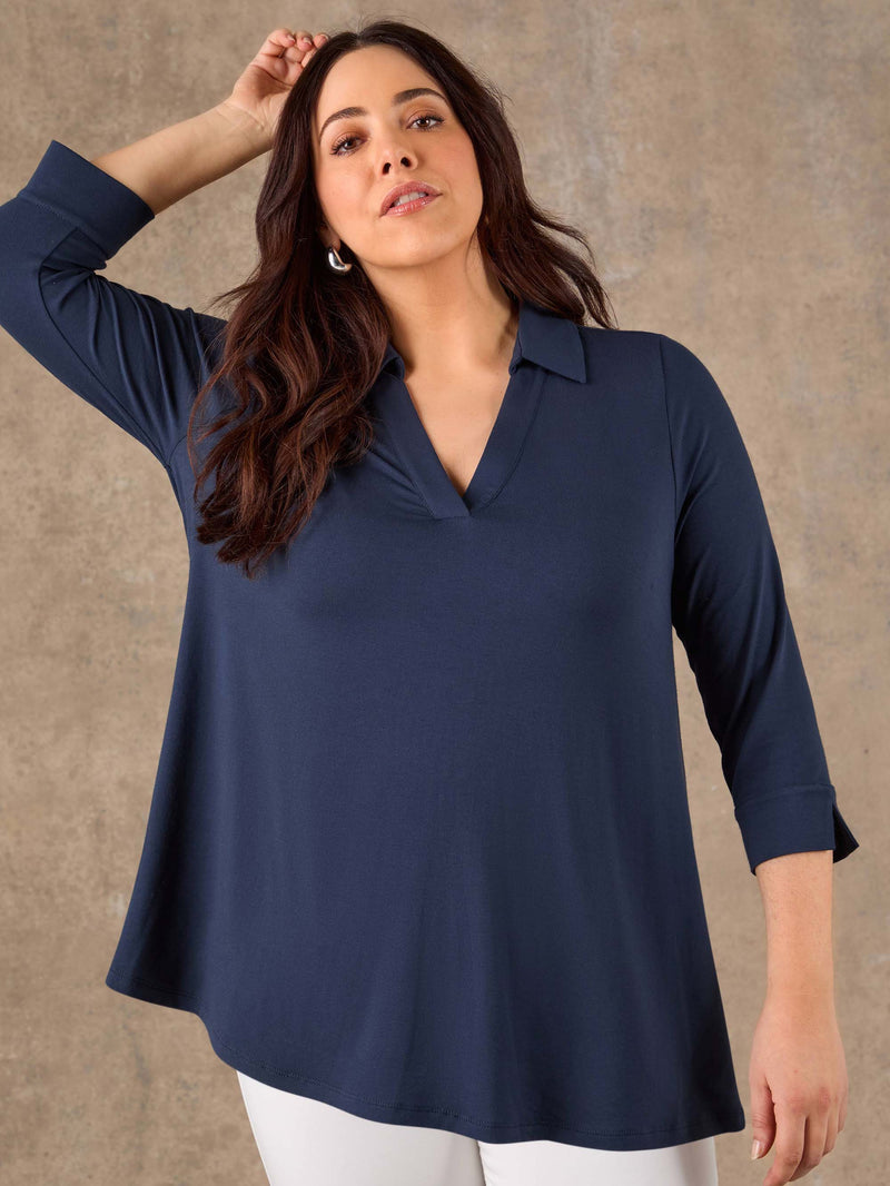 Navy jersey shirt top with relaxed fit and collar detail