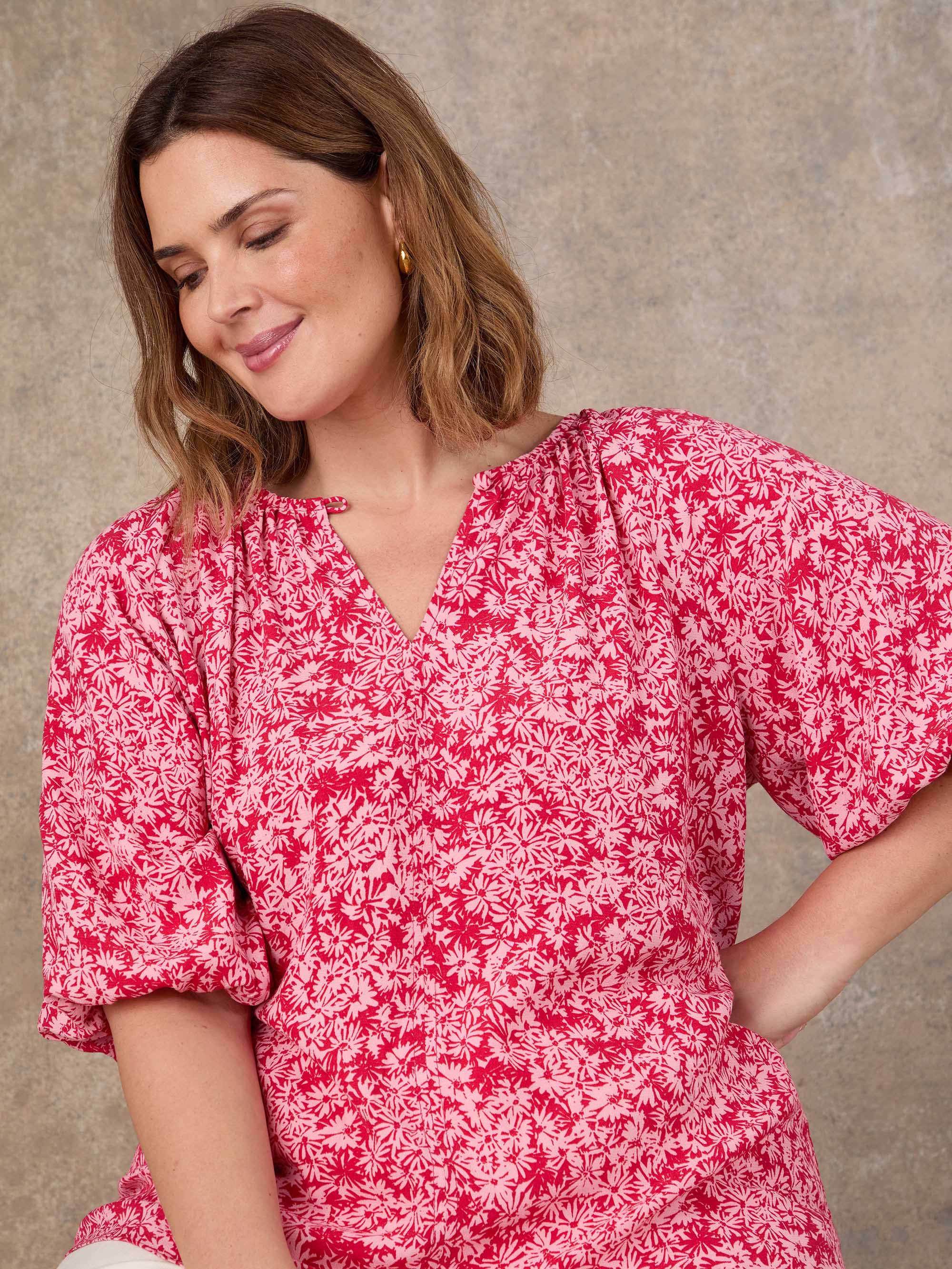 Pink floral blouse with relaxed fit and soft silhouette