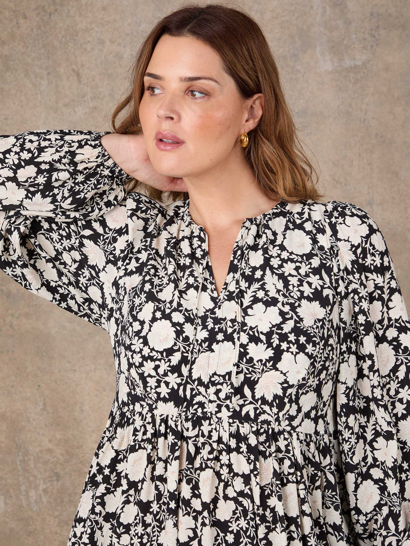 Black and cream floral midaxi dress with tie neckline