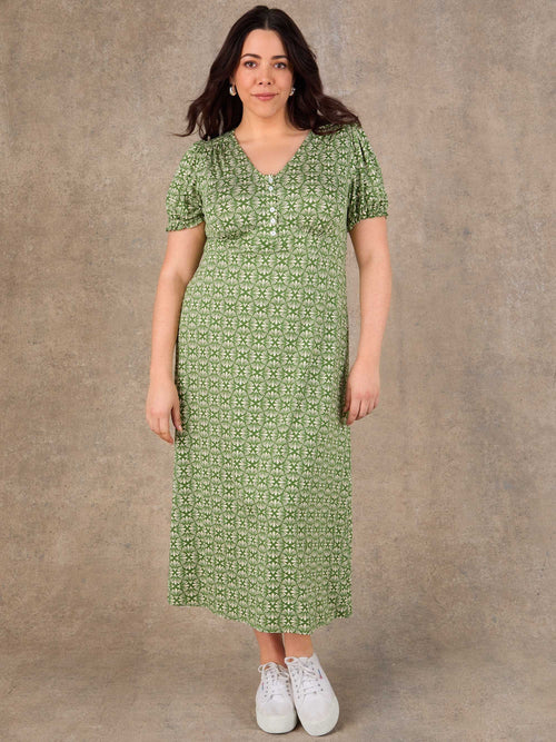 Green ditsy print midi dress with puff sleeves and elasticated waist