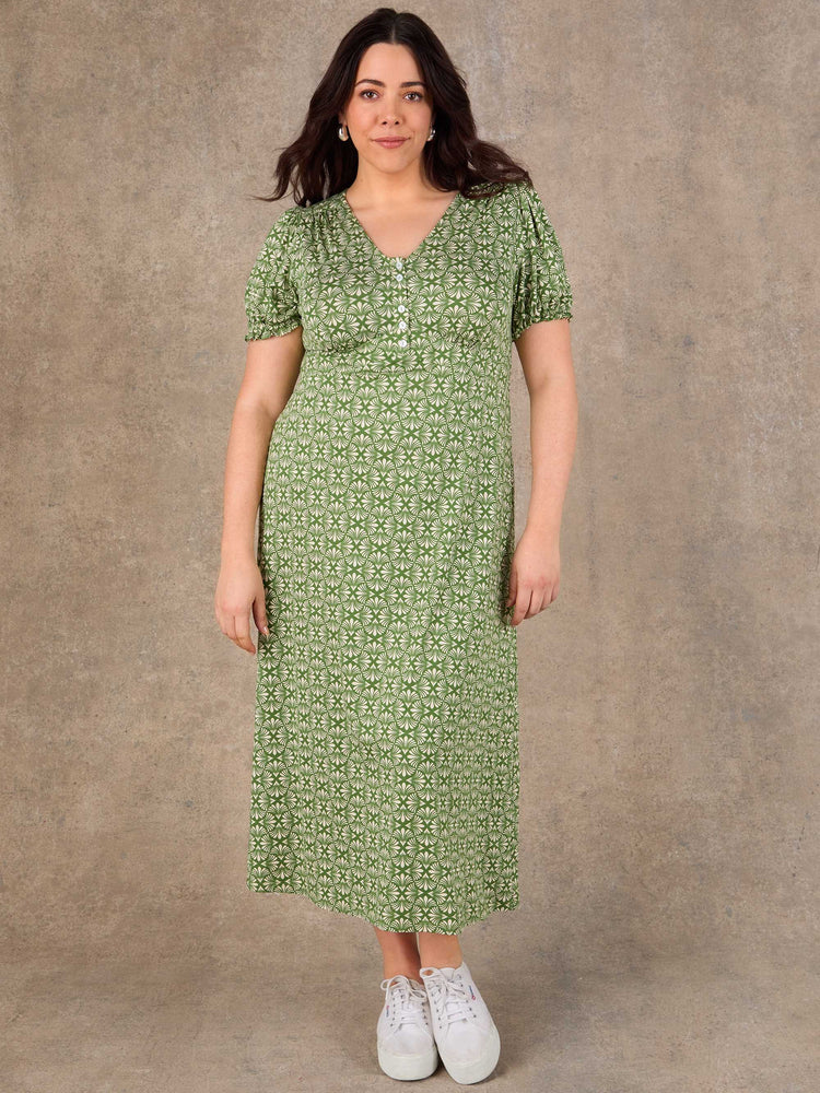 Green ditsy print midi dress with puff sleeves and elasticated waist