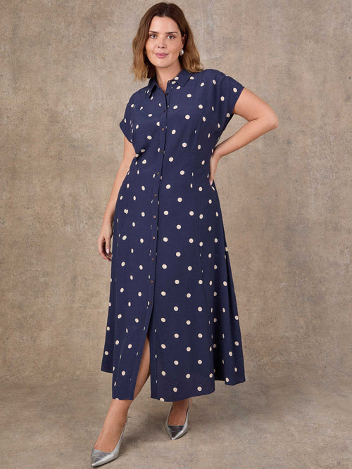 Plus size navy polka dot midaxi shirt dress with button front and tie waist