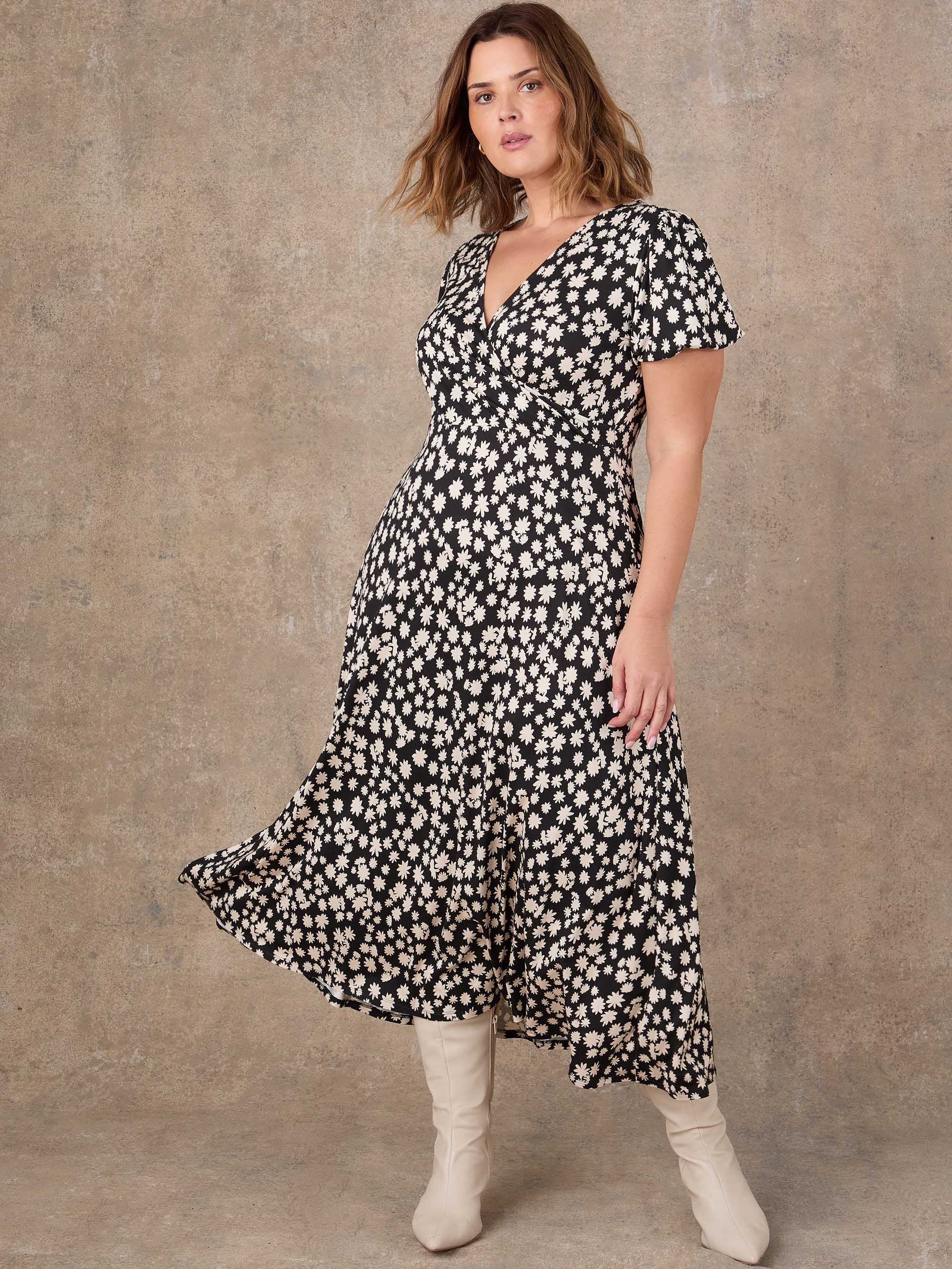 Black ditsy print wrap front midi dress with short sleeves