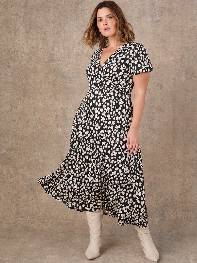 Black ditsy print wrap front midi dress with short sleeves