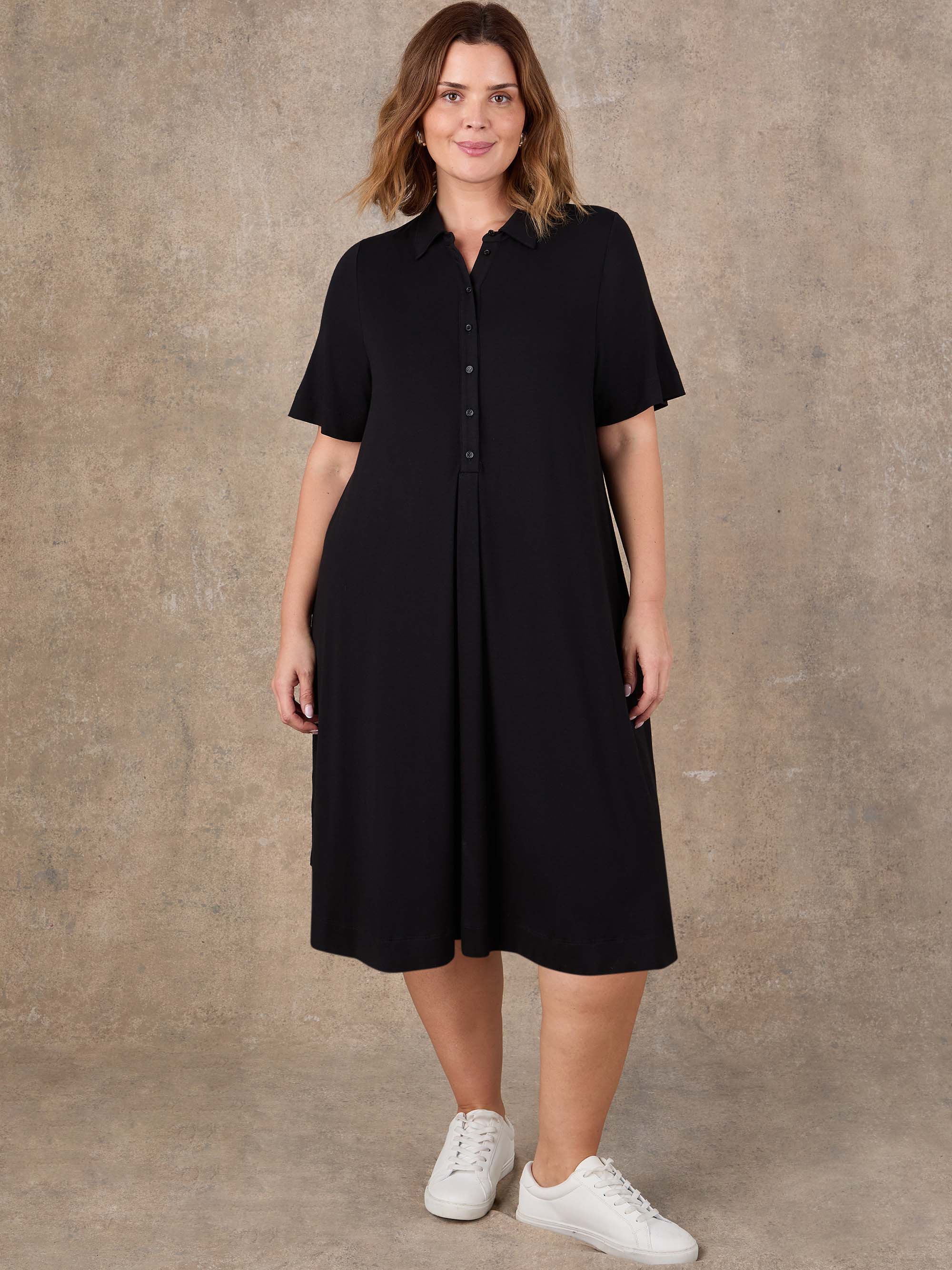 Black midi shirt dress with half placket and box pleat detail