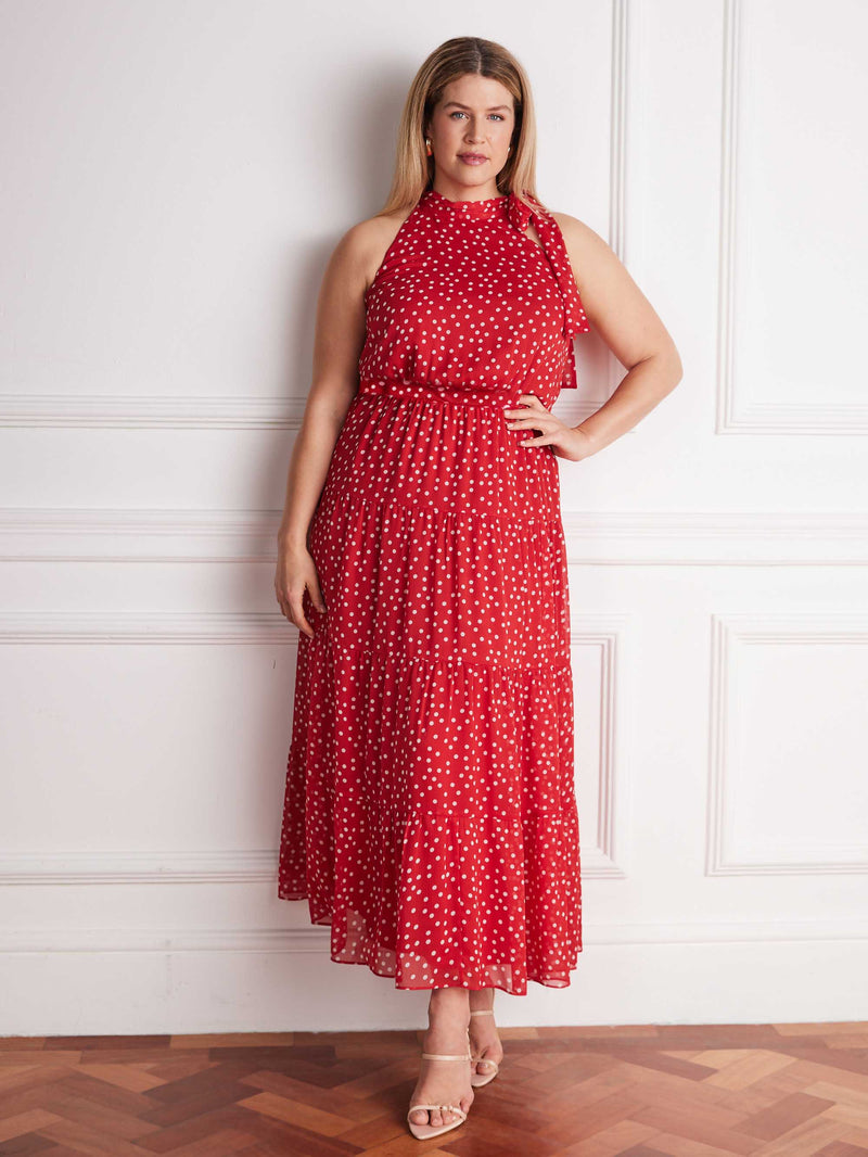 Curve red polka dot halterneck maxi dress with tiered skirt and flowing silhouette