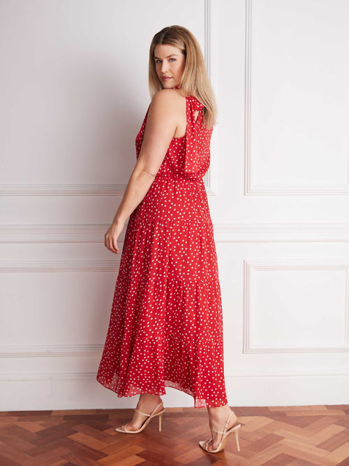 Plus size red spot print maxi dress with halter neckline and gathered tiered panels