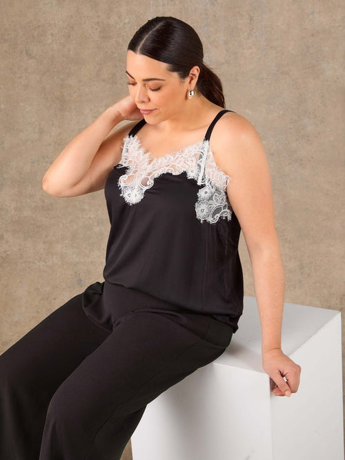 Black occasion trousers with pintuck seams and tailored fit