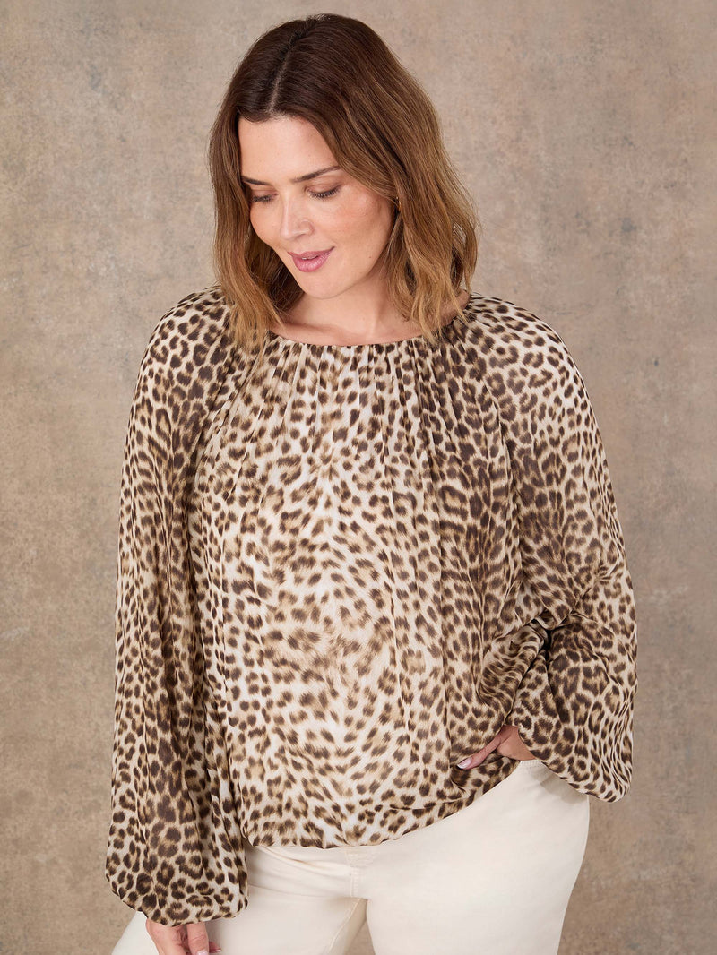 Curve fit animal print boho blouse with elastic cuffs