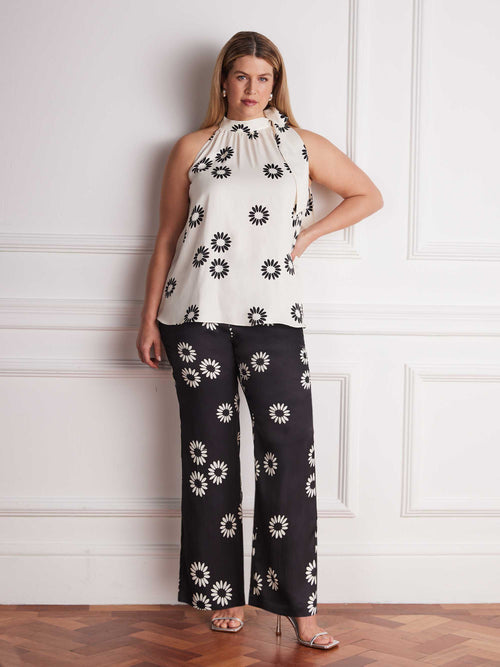 Plus size black floral print straight leg trousers