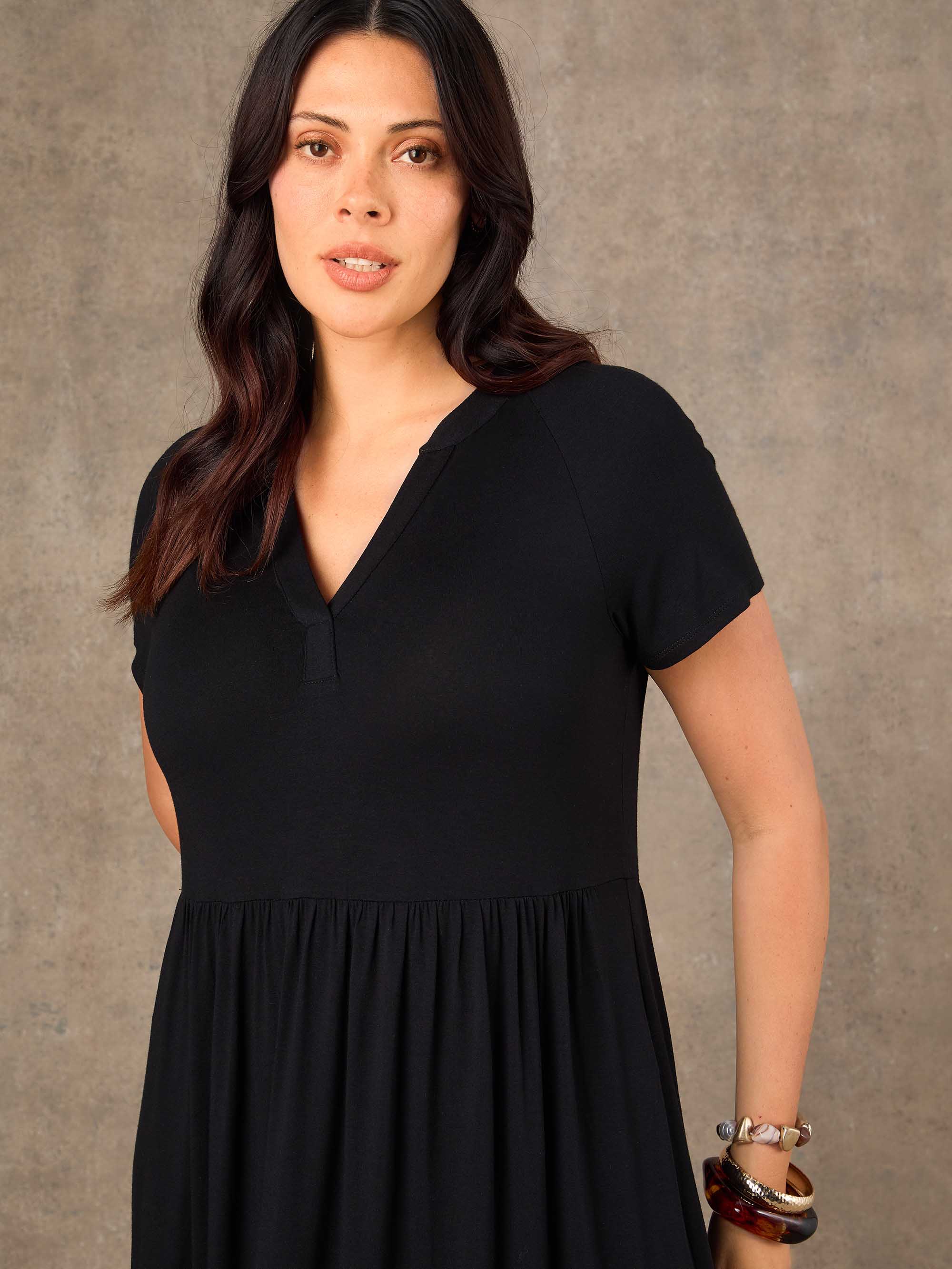 Plus size black short sleeve tiered maxi dress