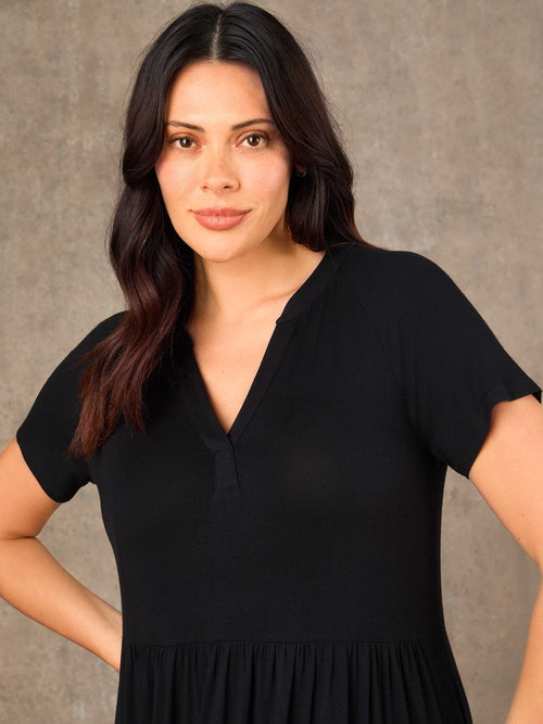 Plus size black tiered maxi dress front view