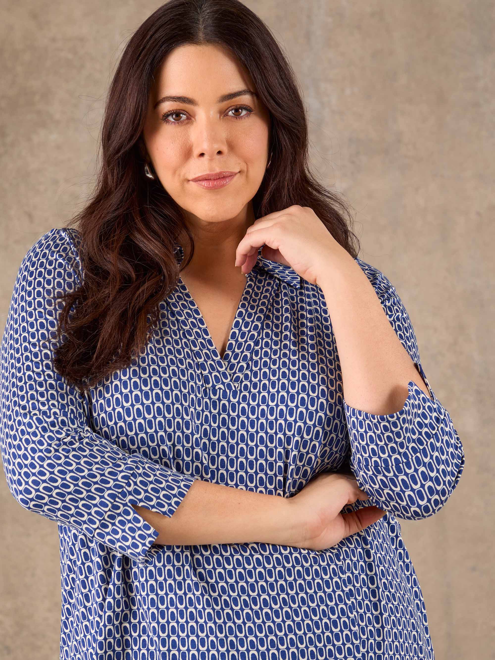 Blue and white printed stretch jersey top with collar