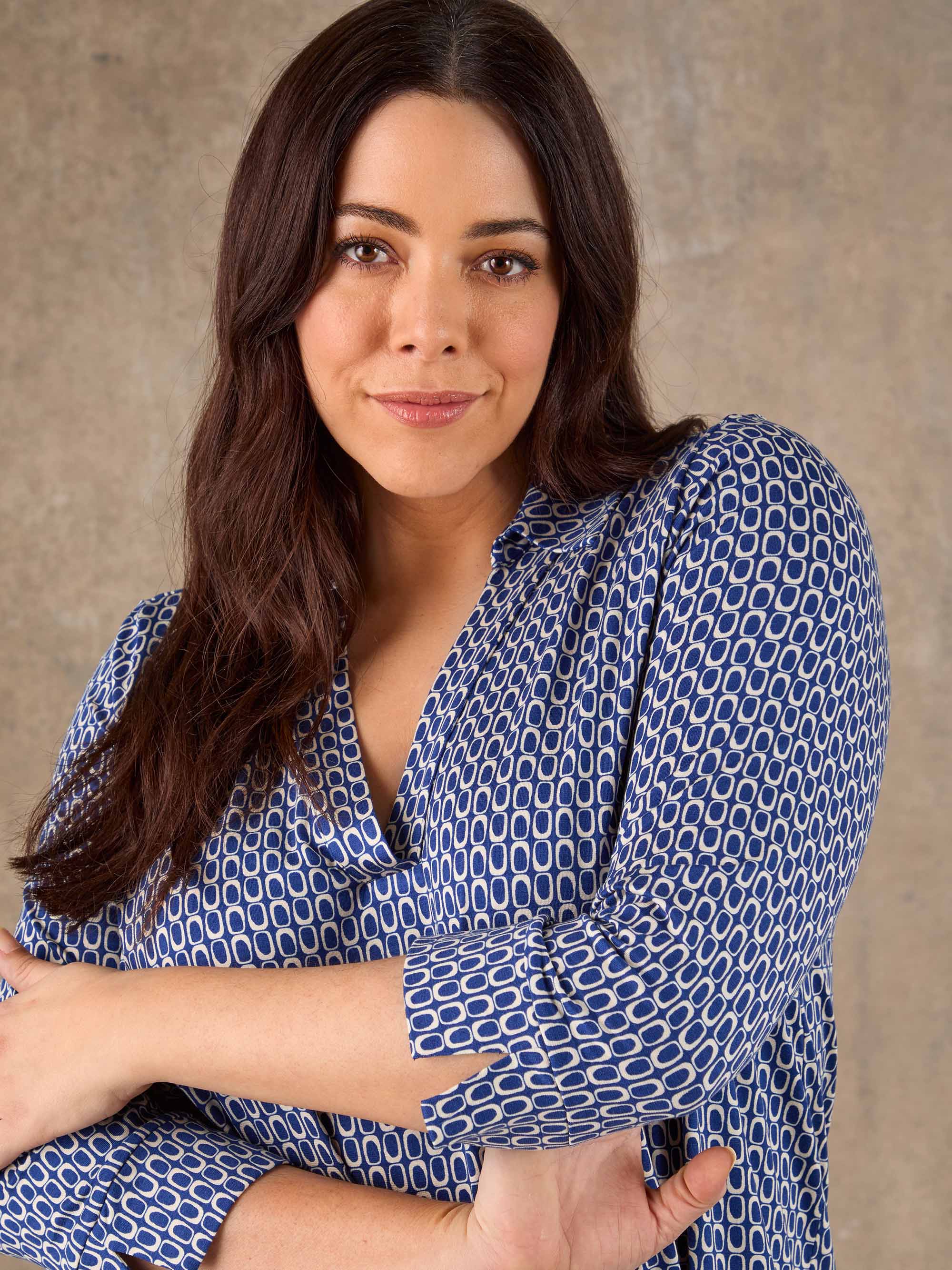 Blue geometric print V neck jersey top with short sleeves