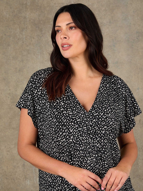 Plus size black ditsy print cap sleeve V neck top