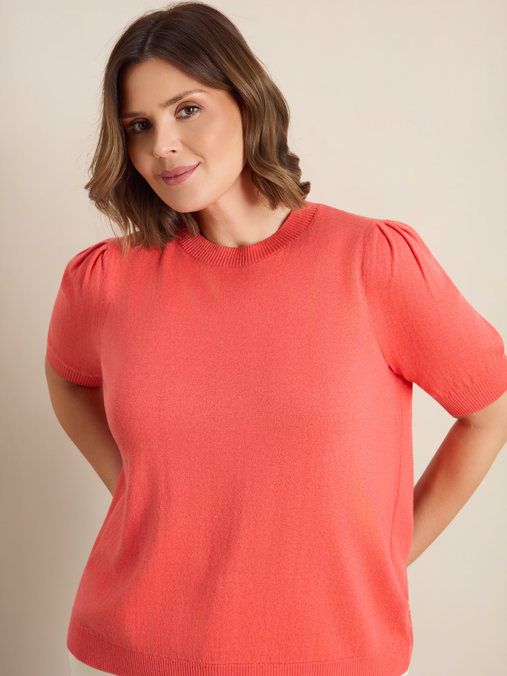 Plus size top with crew neck, short puff sleeves and ribbed trims