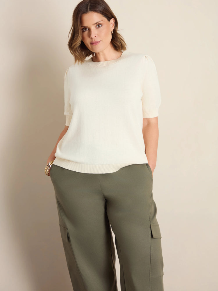Plus size cream crew neck short sleeve knitted top with puff sleeves and ribbed trims