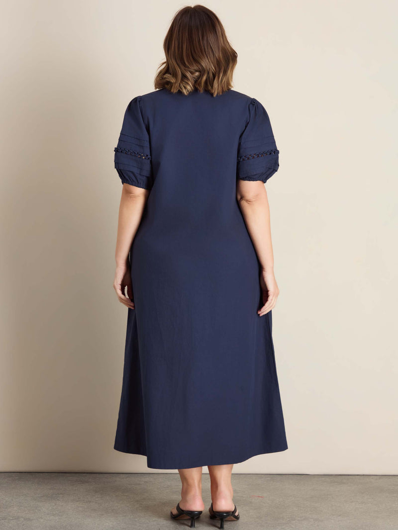 Curve blue midaxi dress with softly puffed sleeves, pleated detailing and a relaxed silhouette.