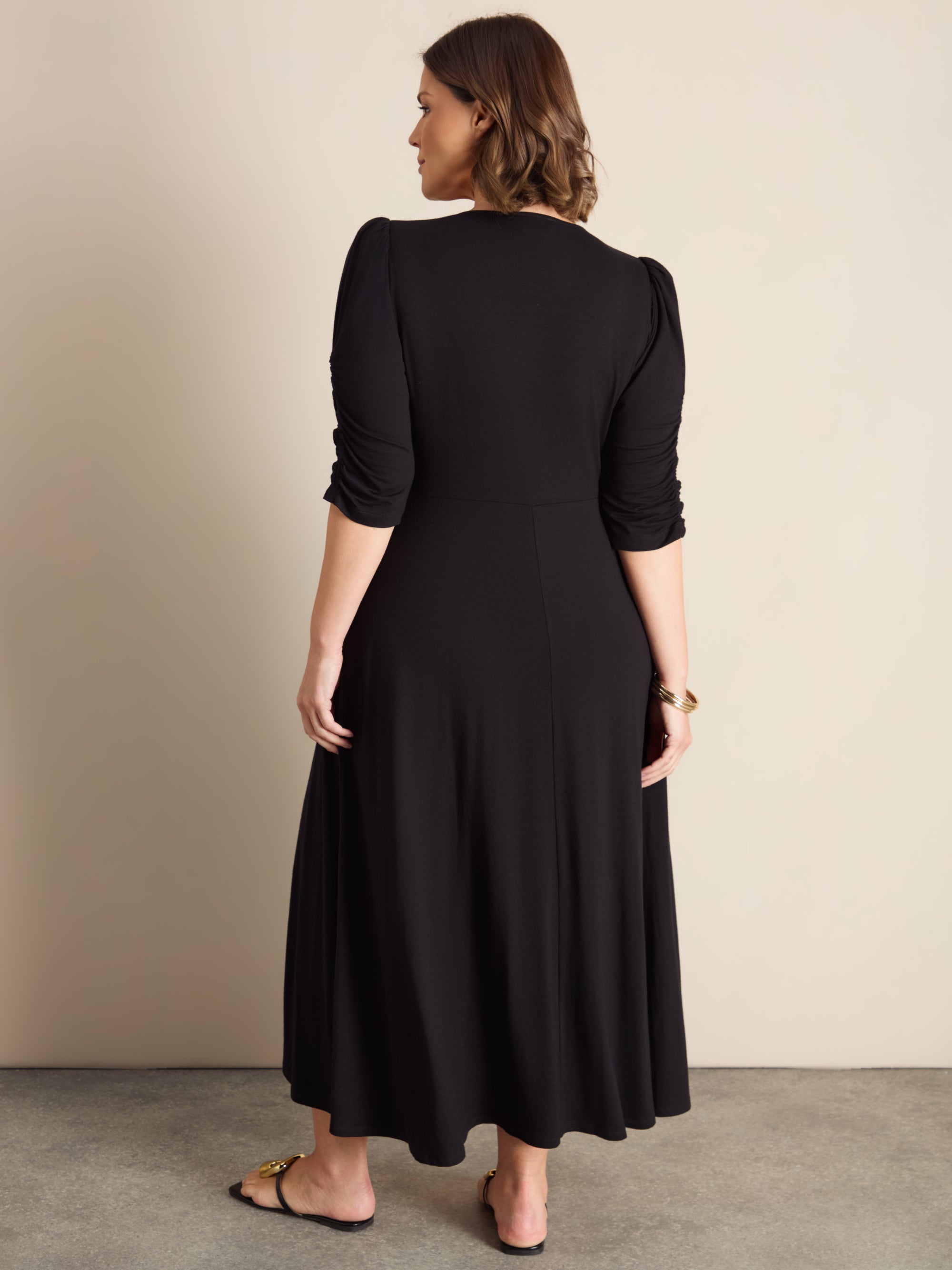 Plus Size Black Jersey Wrap Dress with V-Neck and Swing Skirt