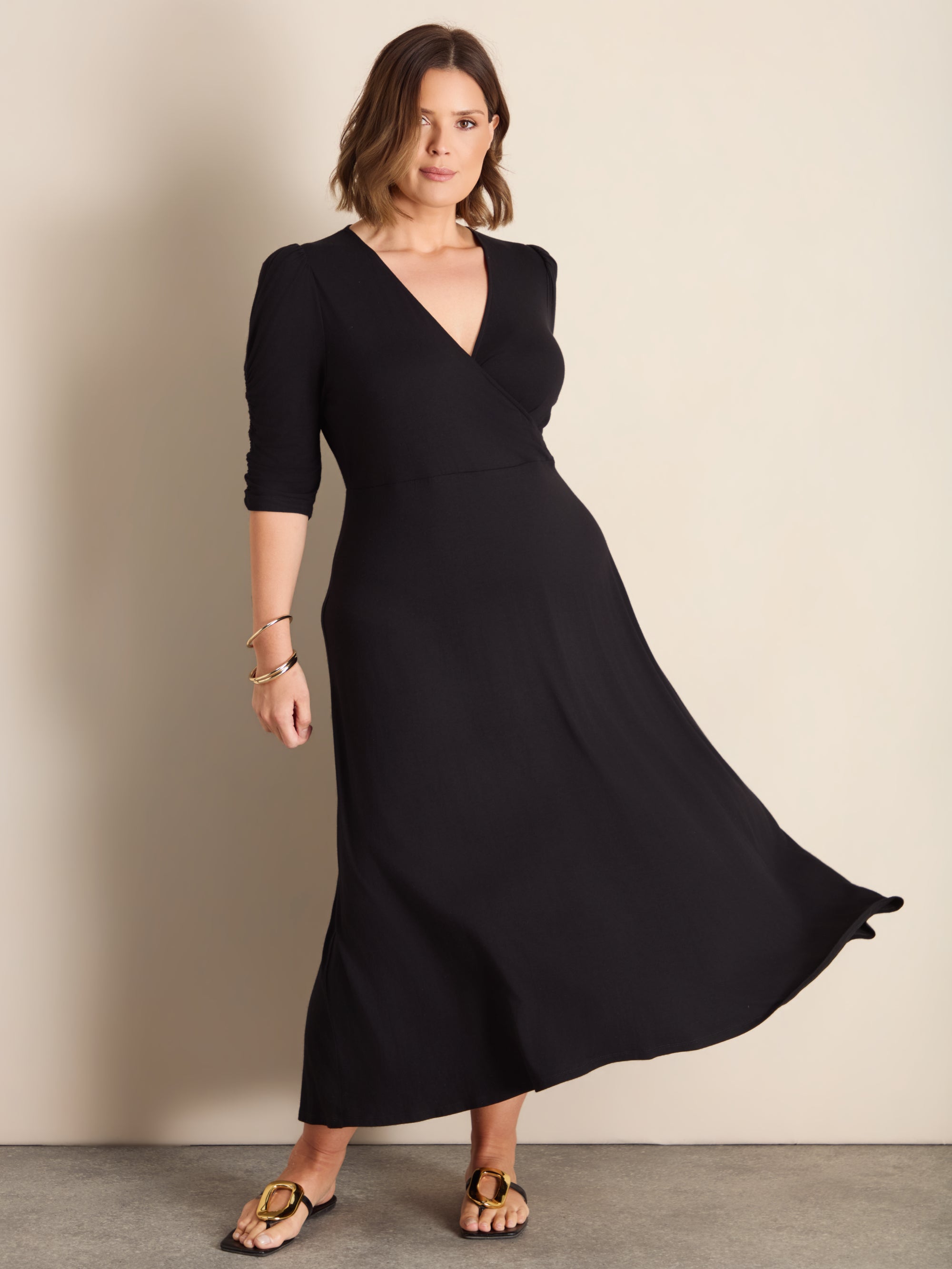 Plus Size Black Jersey Wrap Dress with V-Neck and Swing Skirt