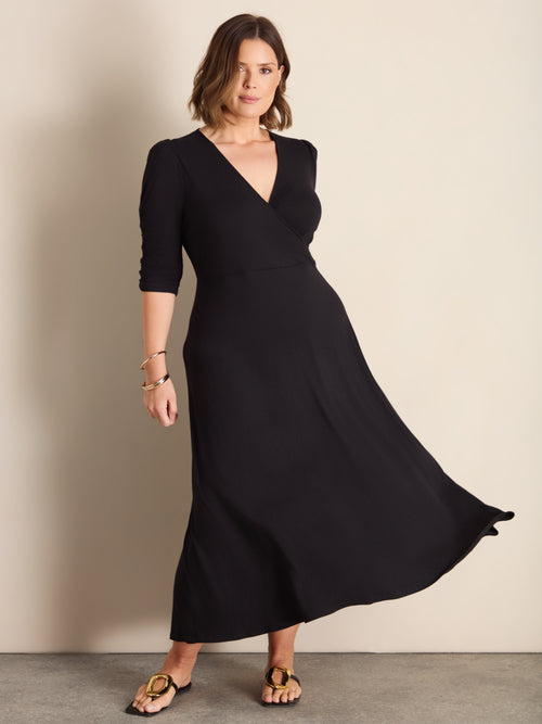 Plus Size Black Jersey Wrap Dress with V-Neck and Swing Skirt