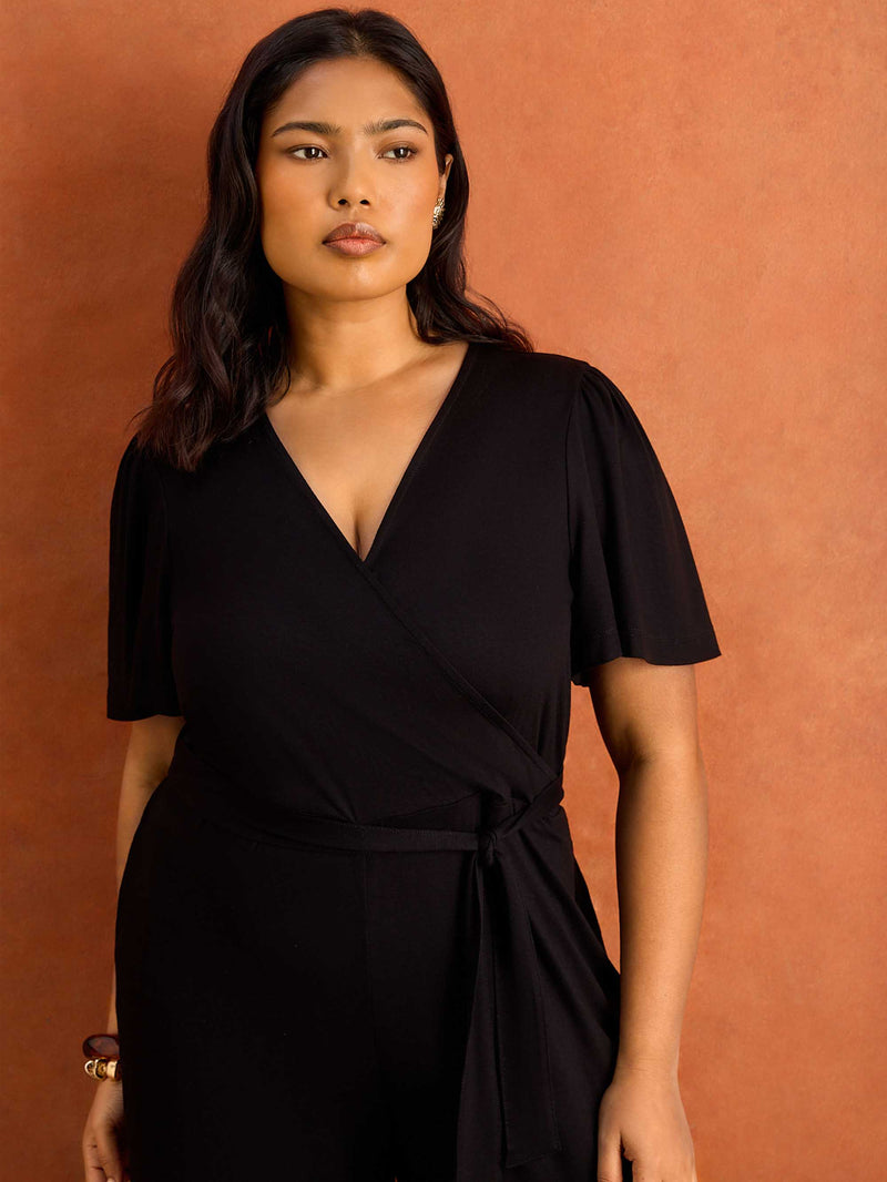 Black V Neck Wrap Flutter Sleeve Jersey Jumpsuit