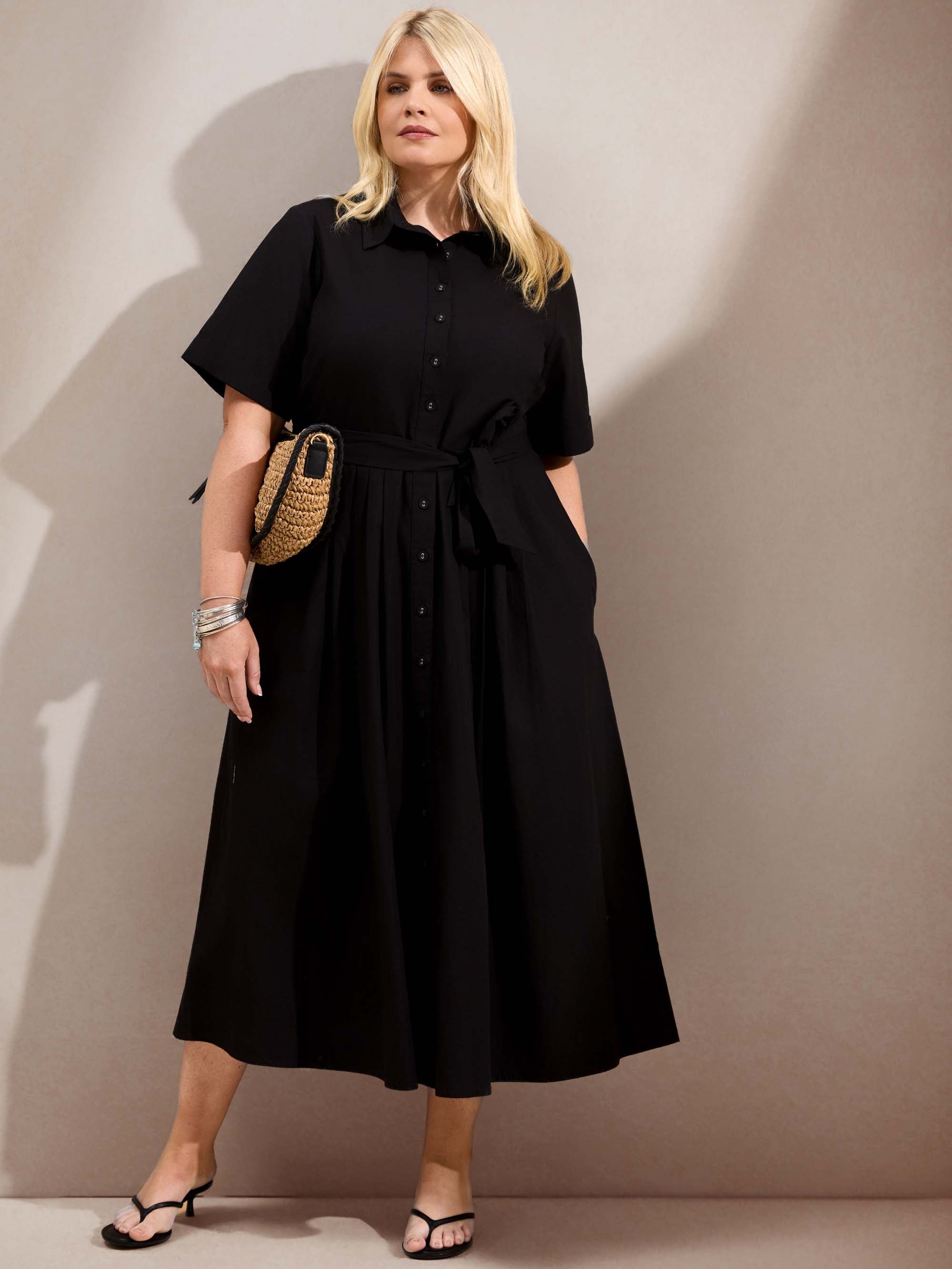 Curve black cotton poplin shirtdress with a collared neckline, tie waist and button-through front.