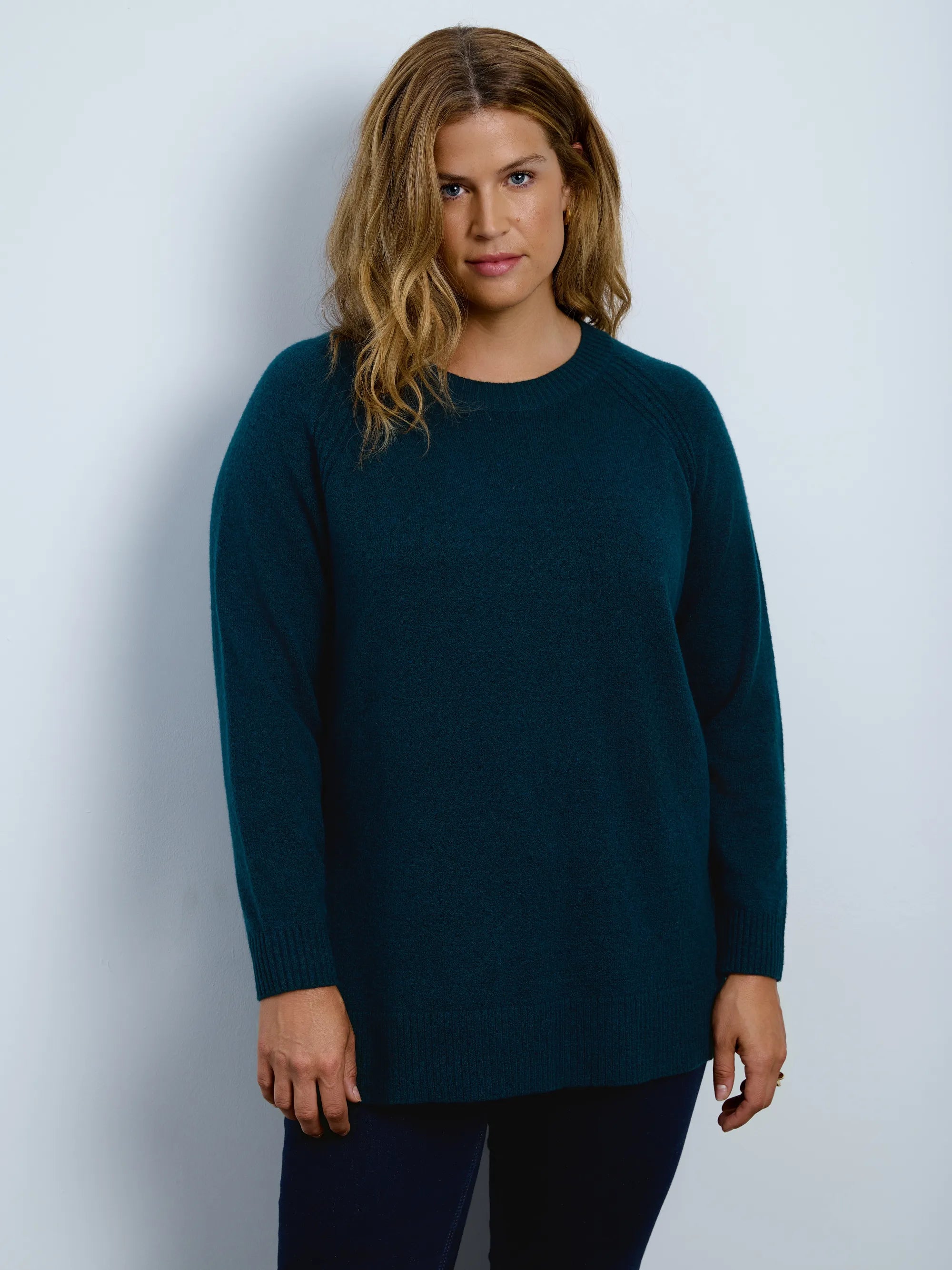 Deep teal green crew neck longline knitted jumper with long sleeves and a relaxed fit.