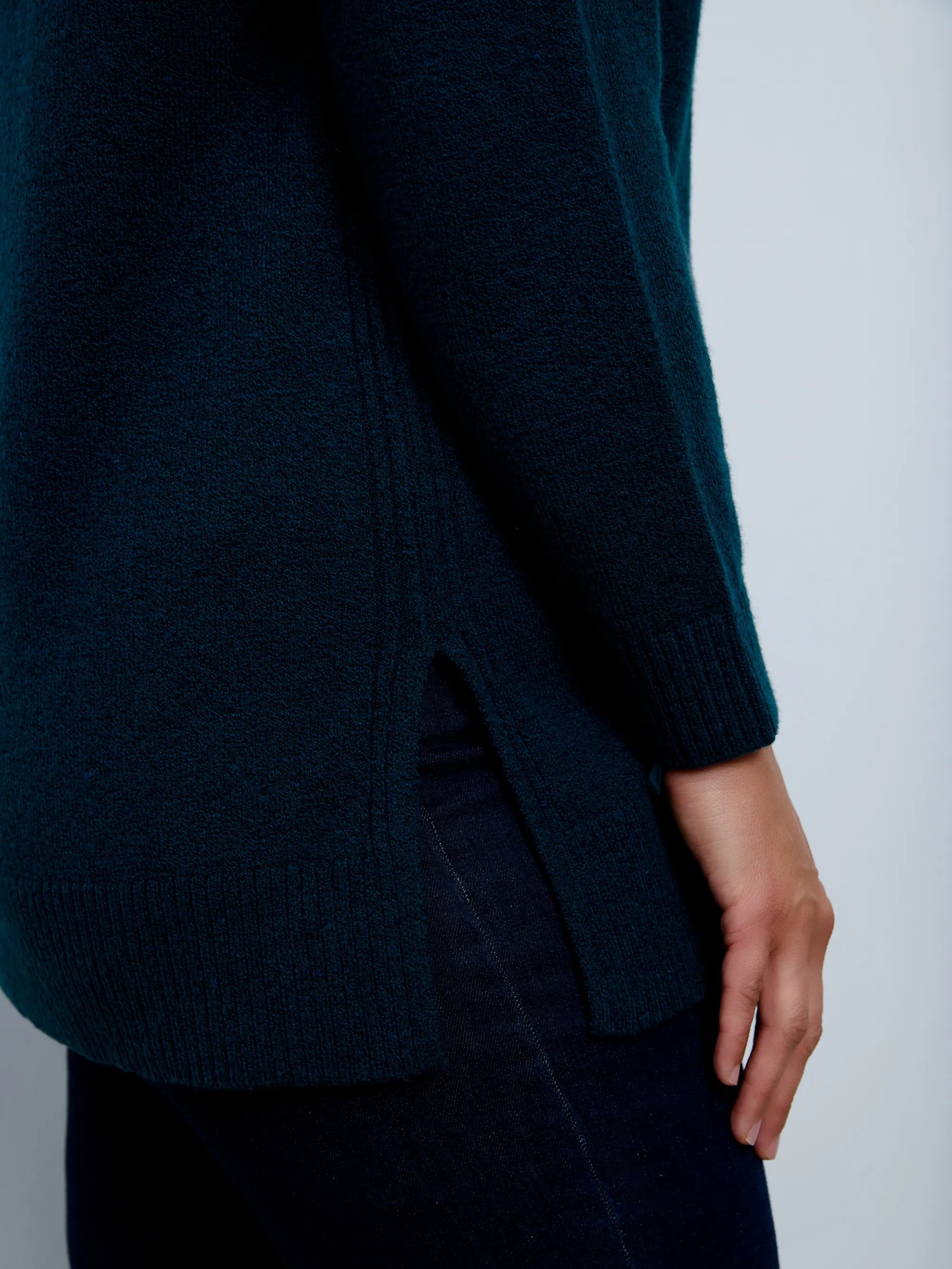 Deep teal green crew neck longline knitted jumper with long sleeves and a relaxed fit.