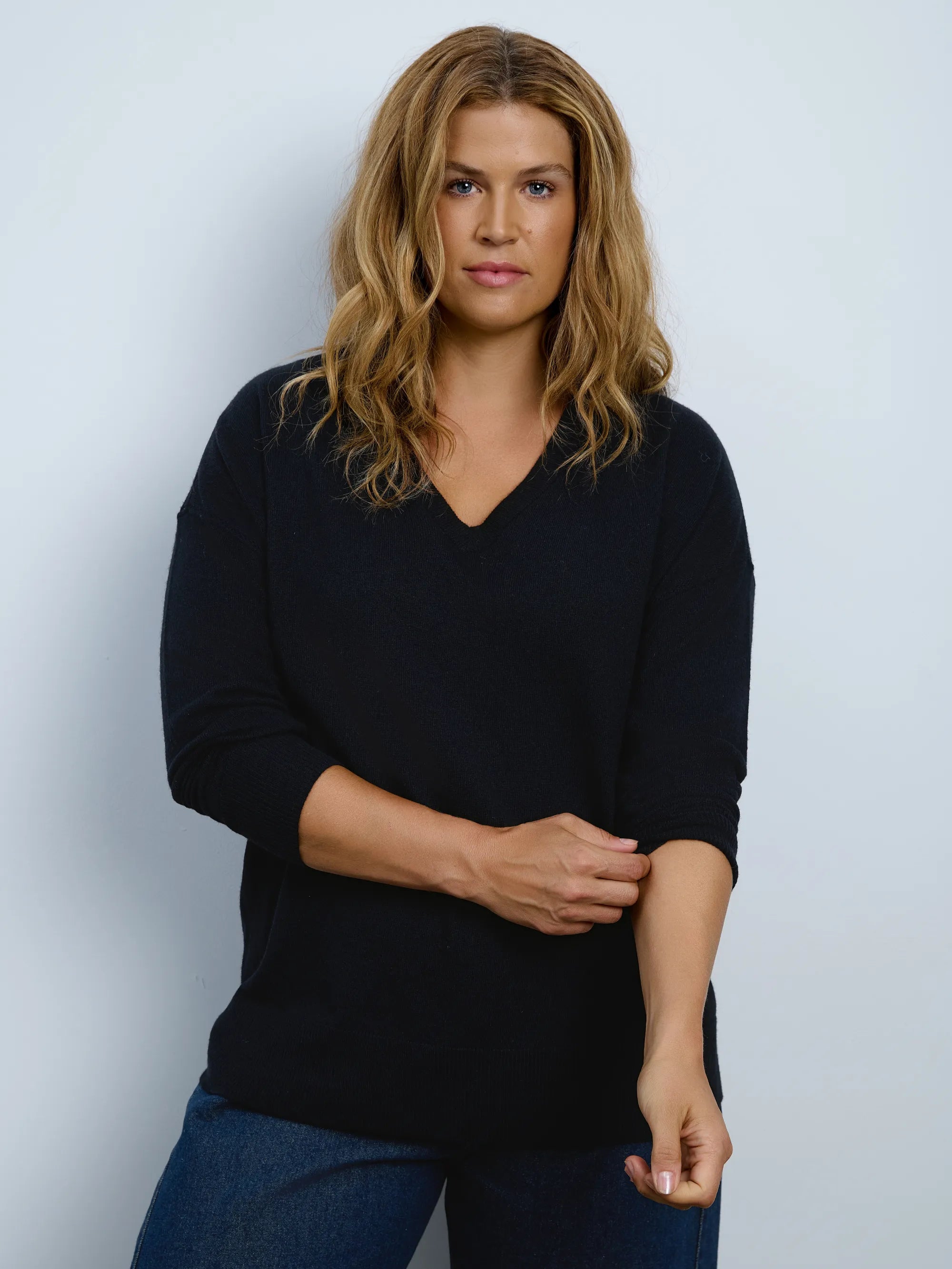 Plus size black V-neck knitted jumper