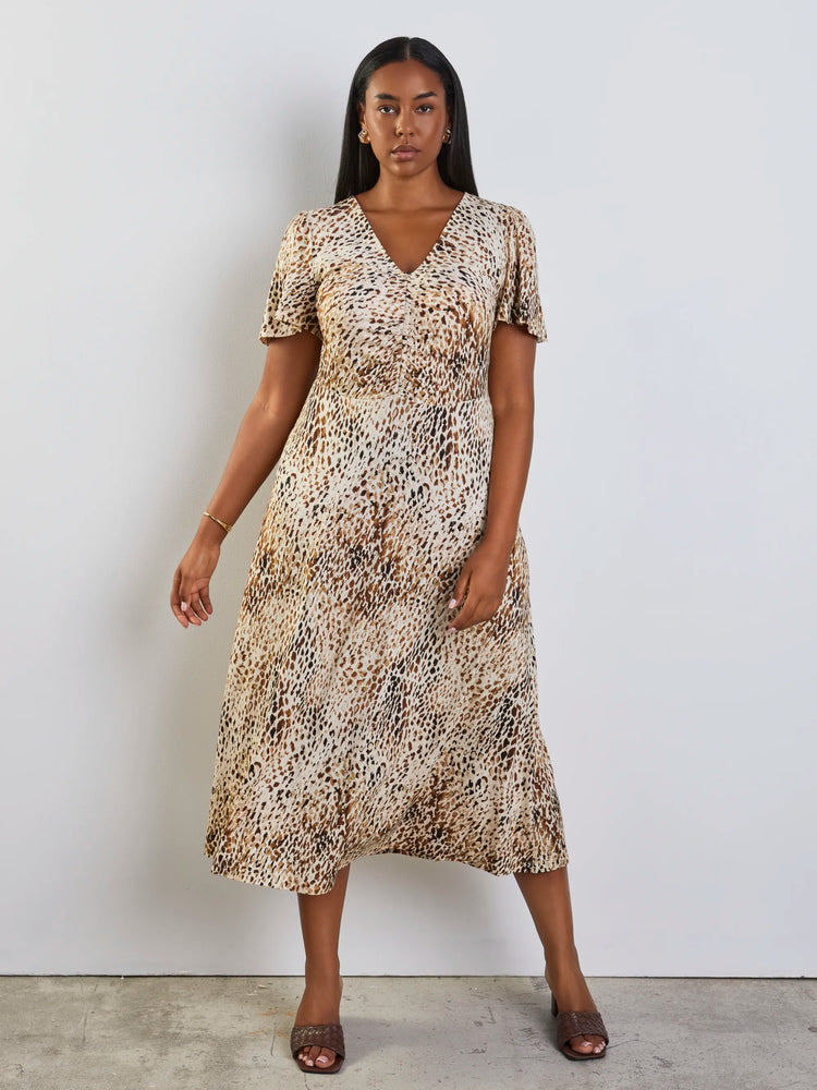 Plus size neutral animal print dress