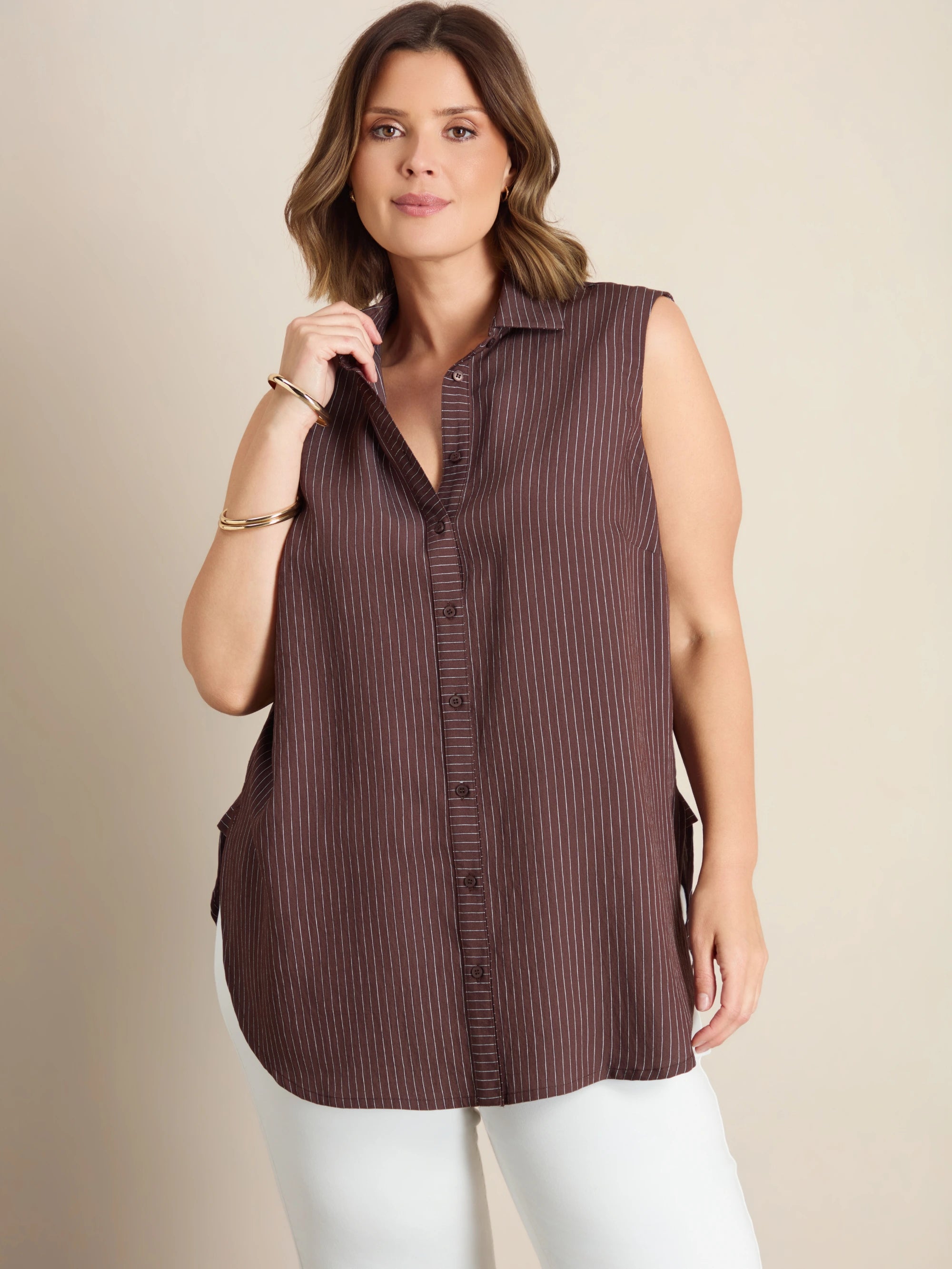 Plus size brown striped sleeveless shirt with collar and button-through front