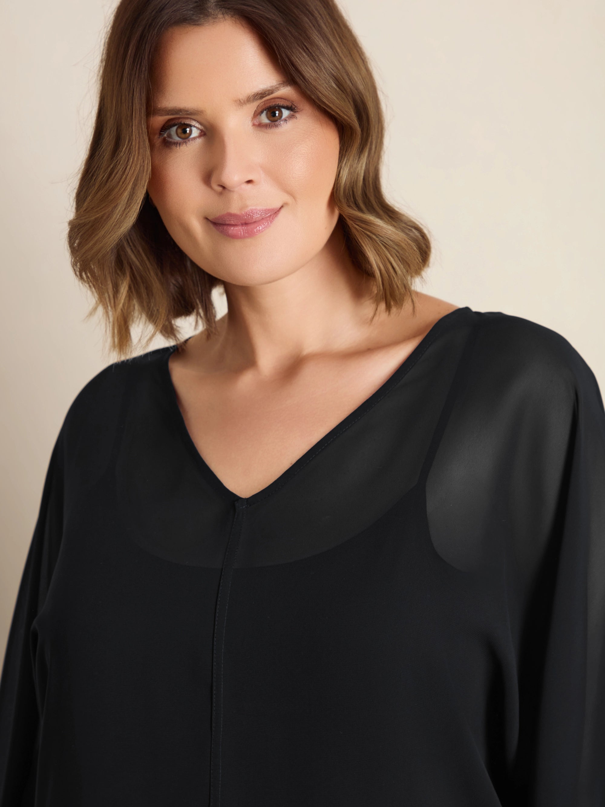 Plus size black chiffon peplum top