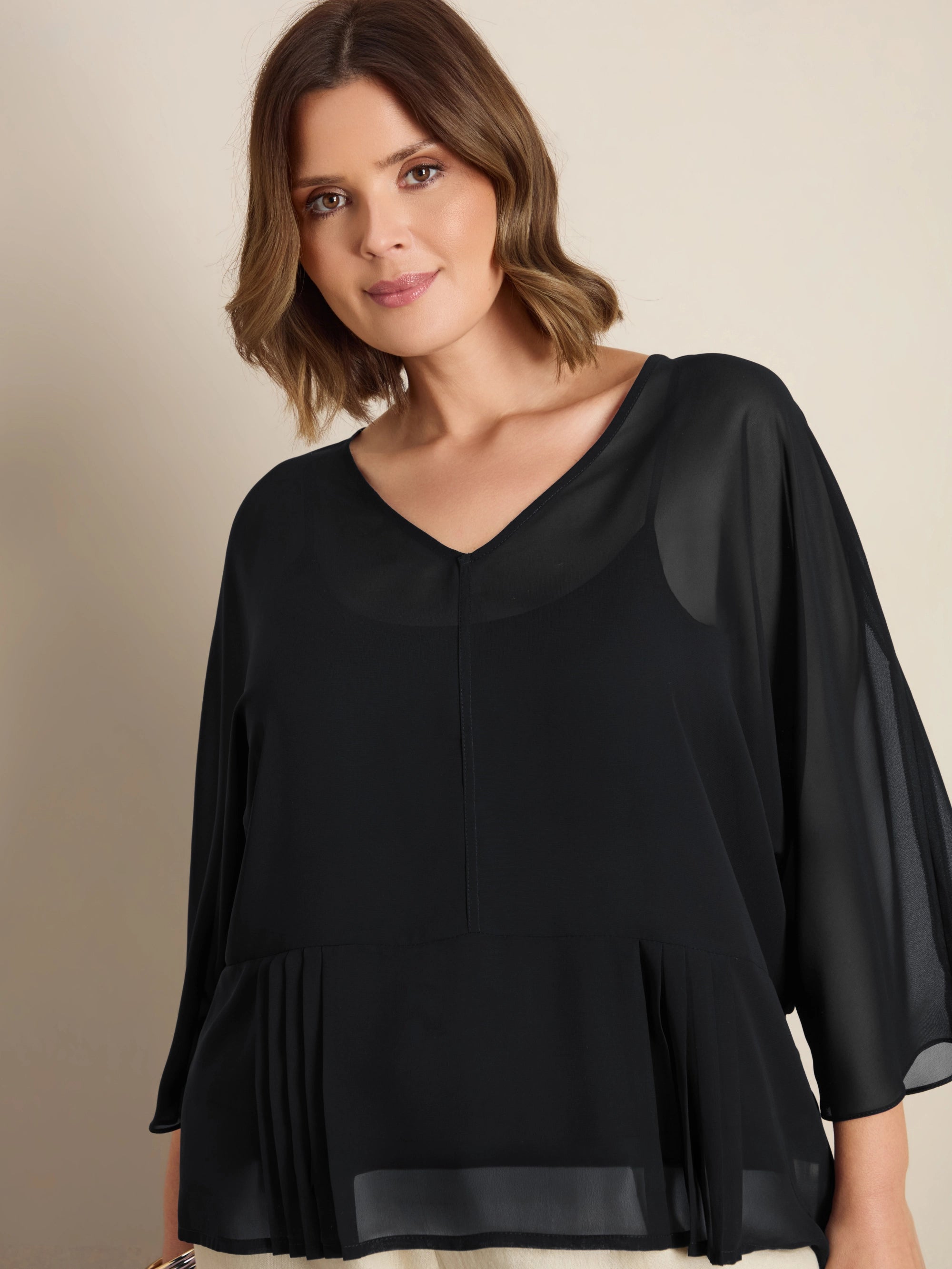 Plus size black chiffon peplum top