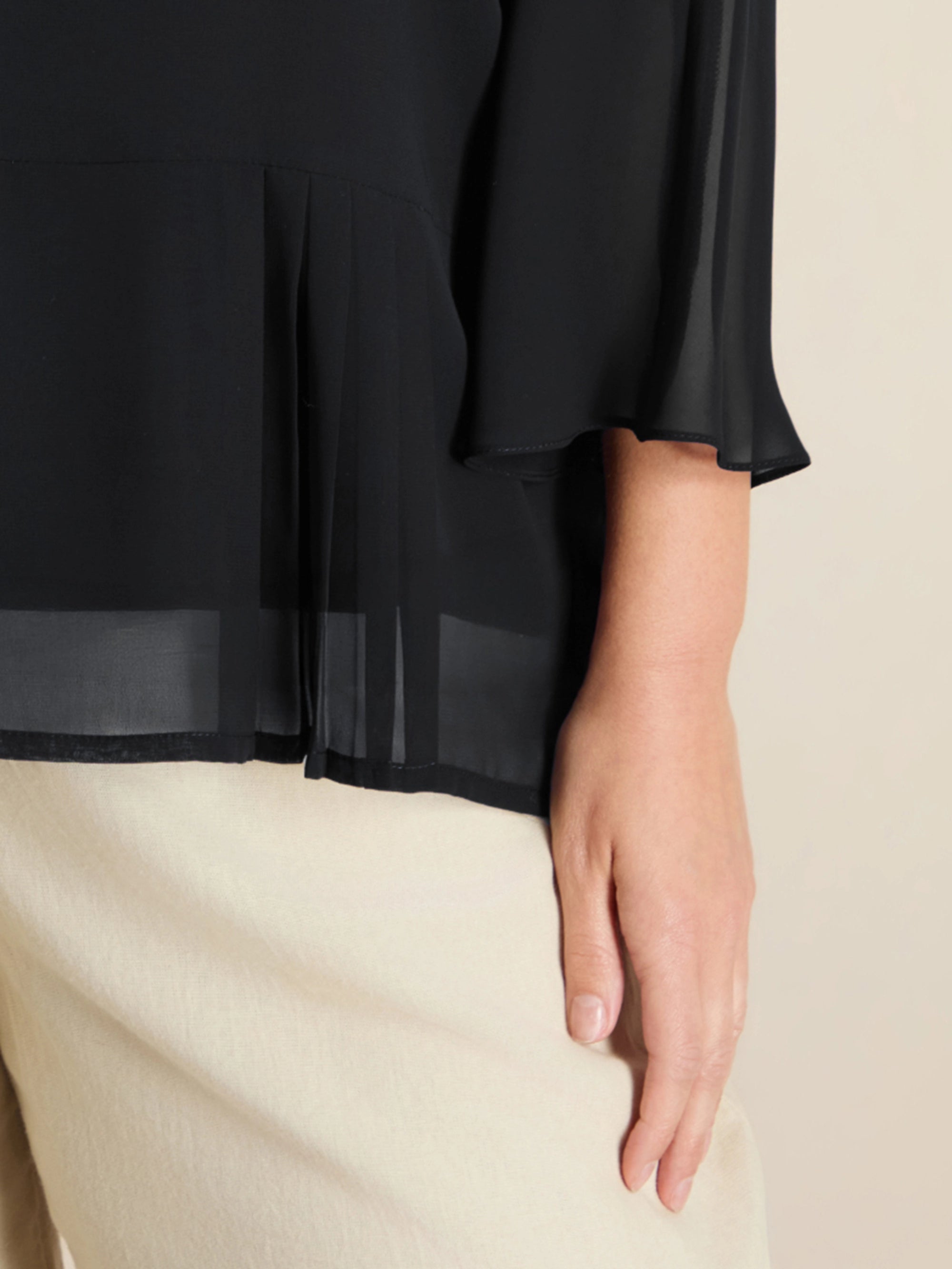 Plus size black chiffon peplum top